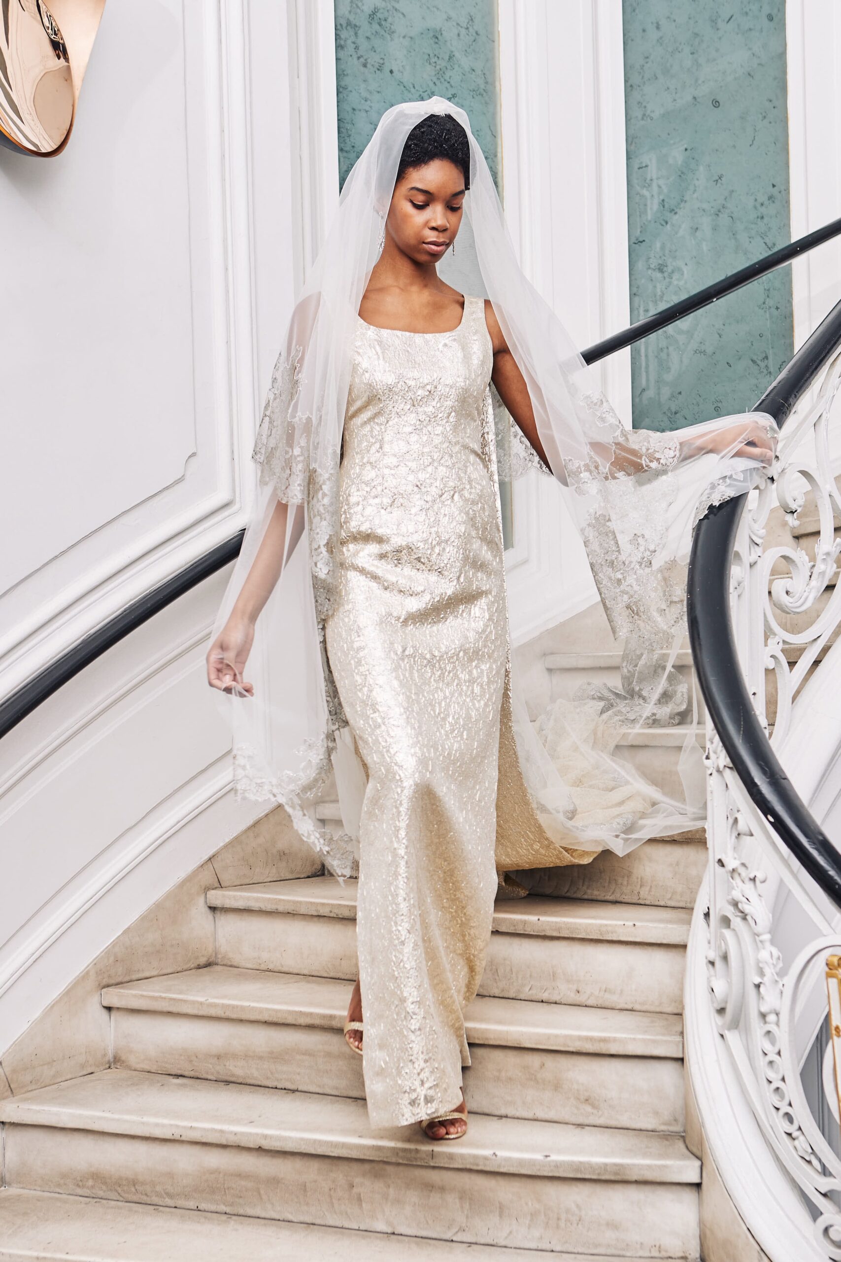 gold sequin fitted gown with veil