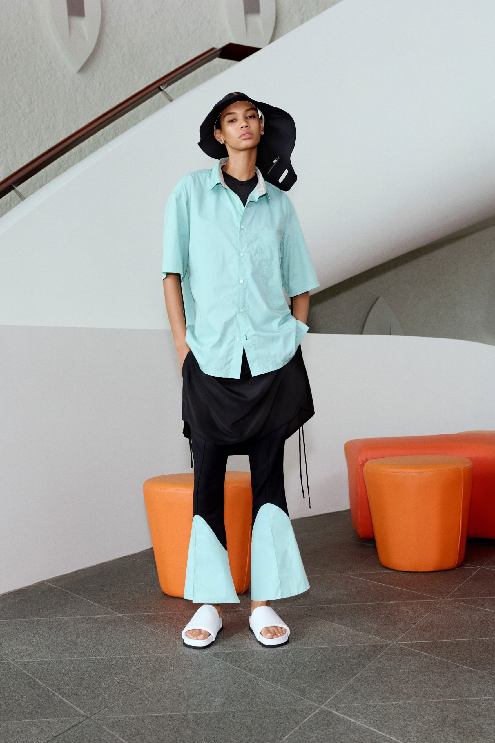 blue cotton shirt with black skirt