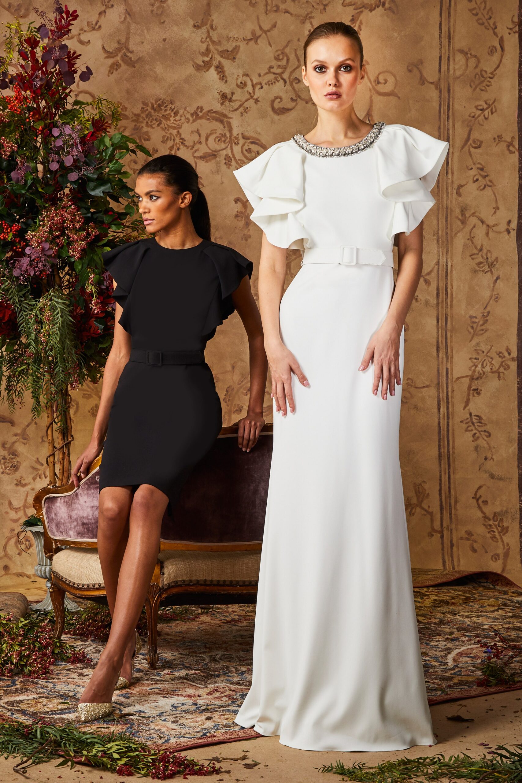 white silk gown and black dress