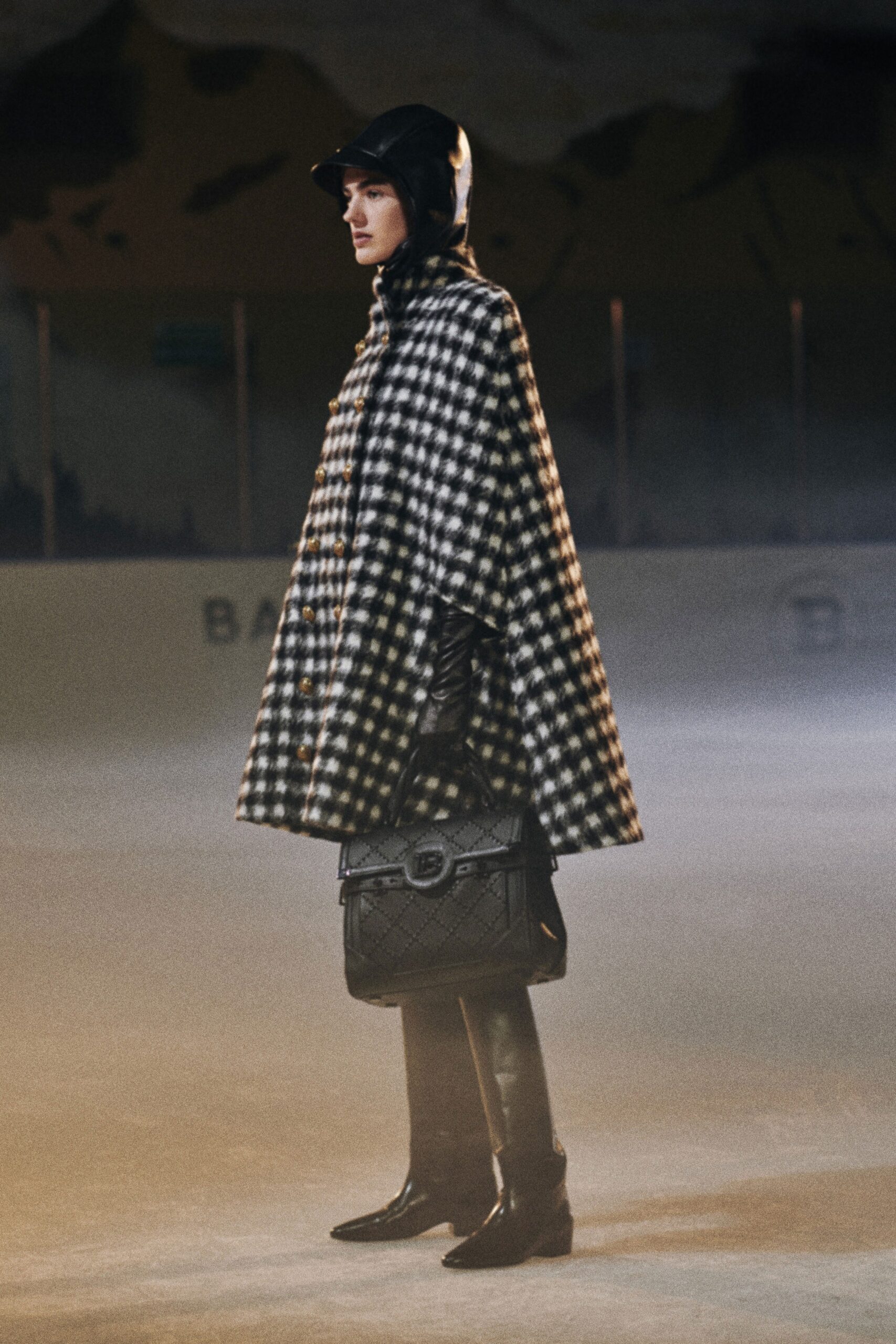 black and white checked cape