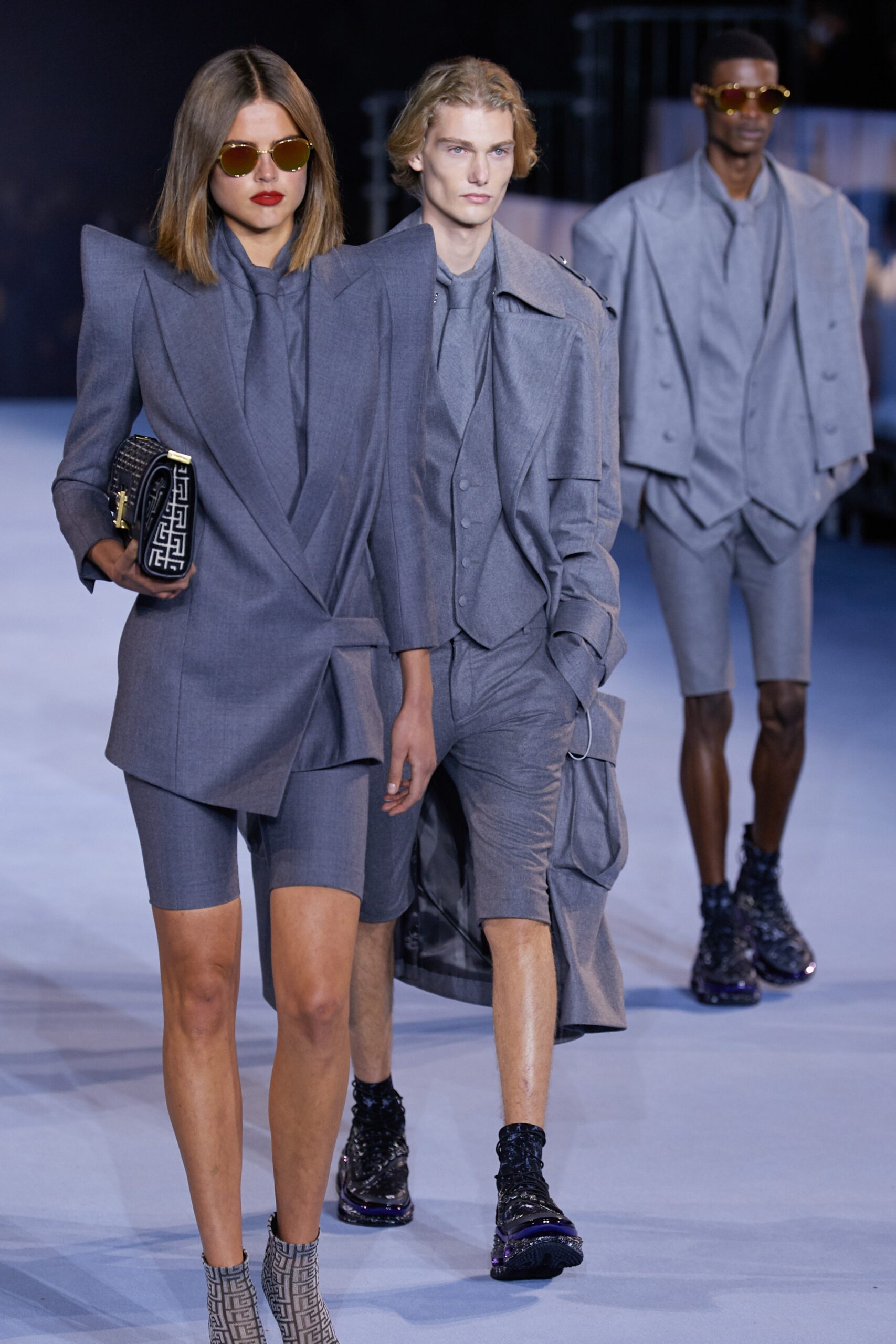 gray structured blazer with fitted shorts