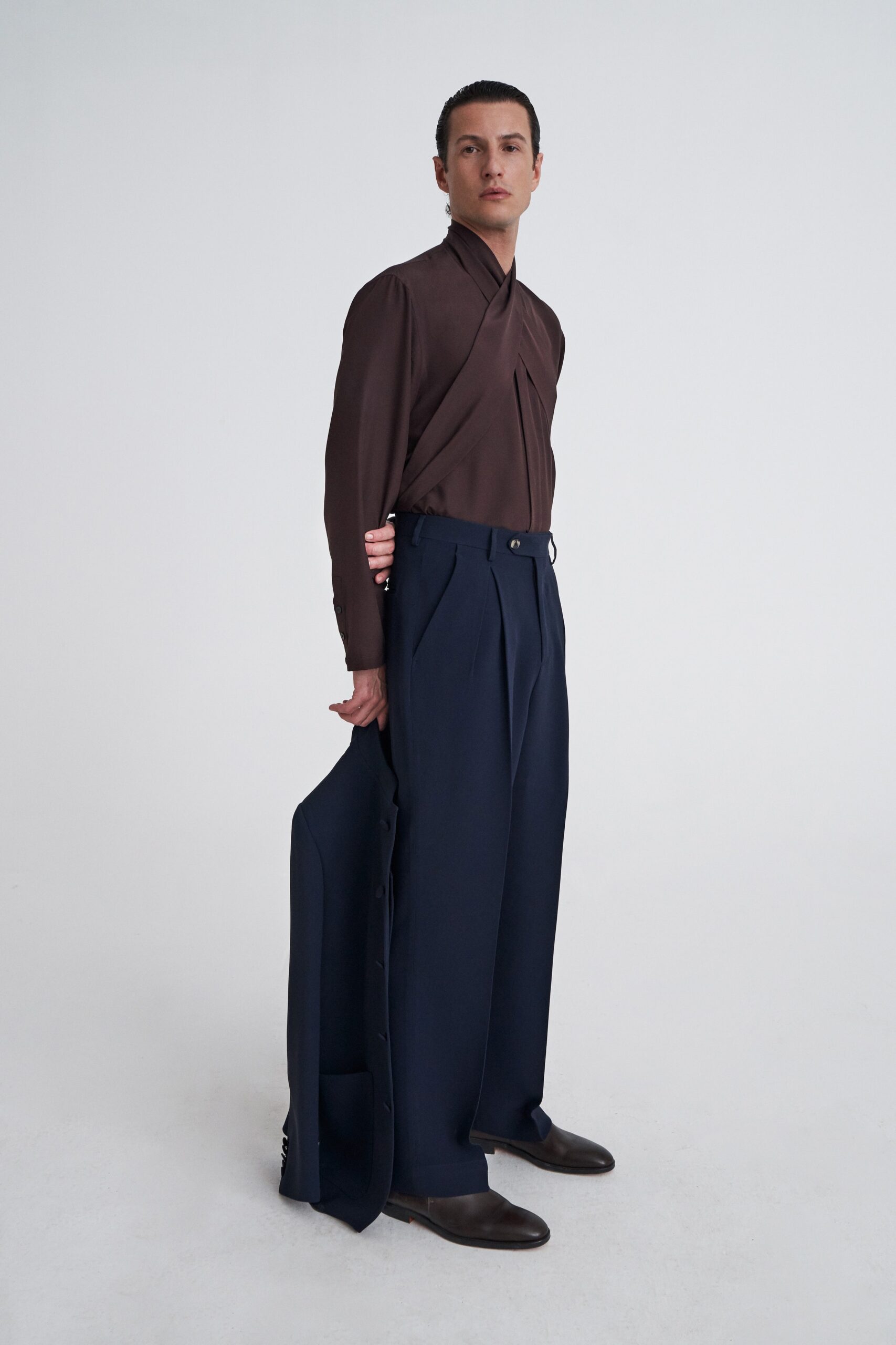 brown silk shirt with tailored pants