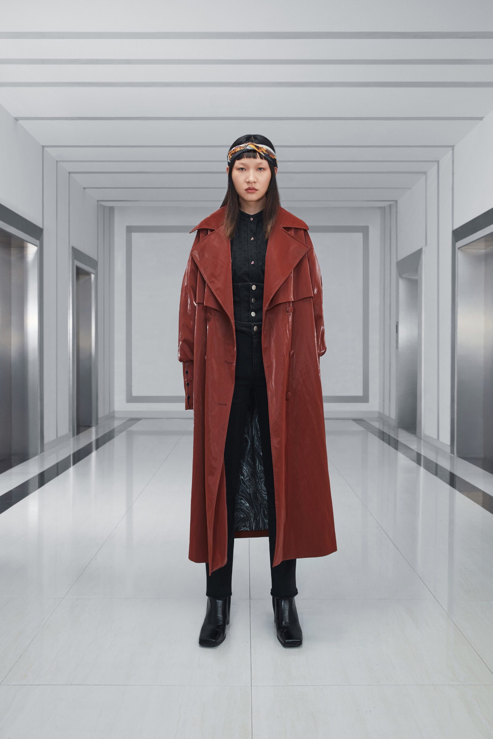 red vinyl coat with black shirt