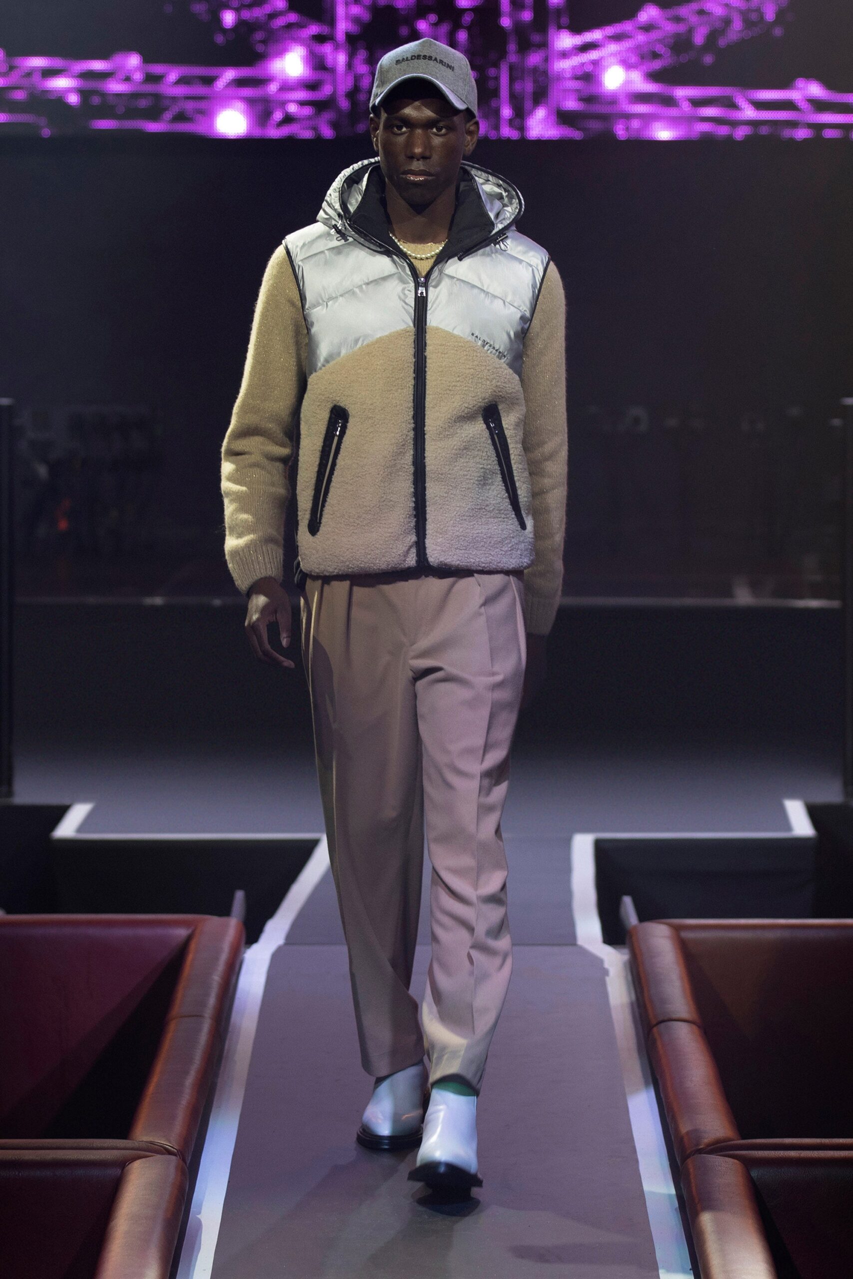 beige faux-fur jacket with gray pants