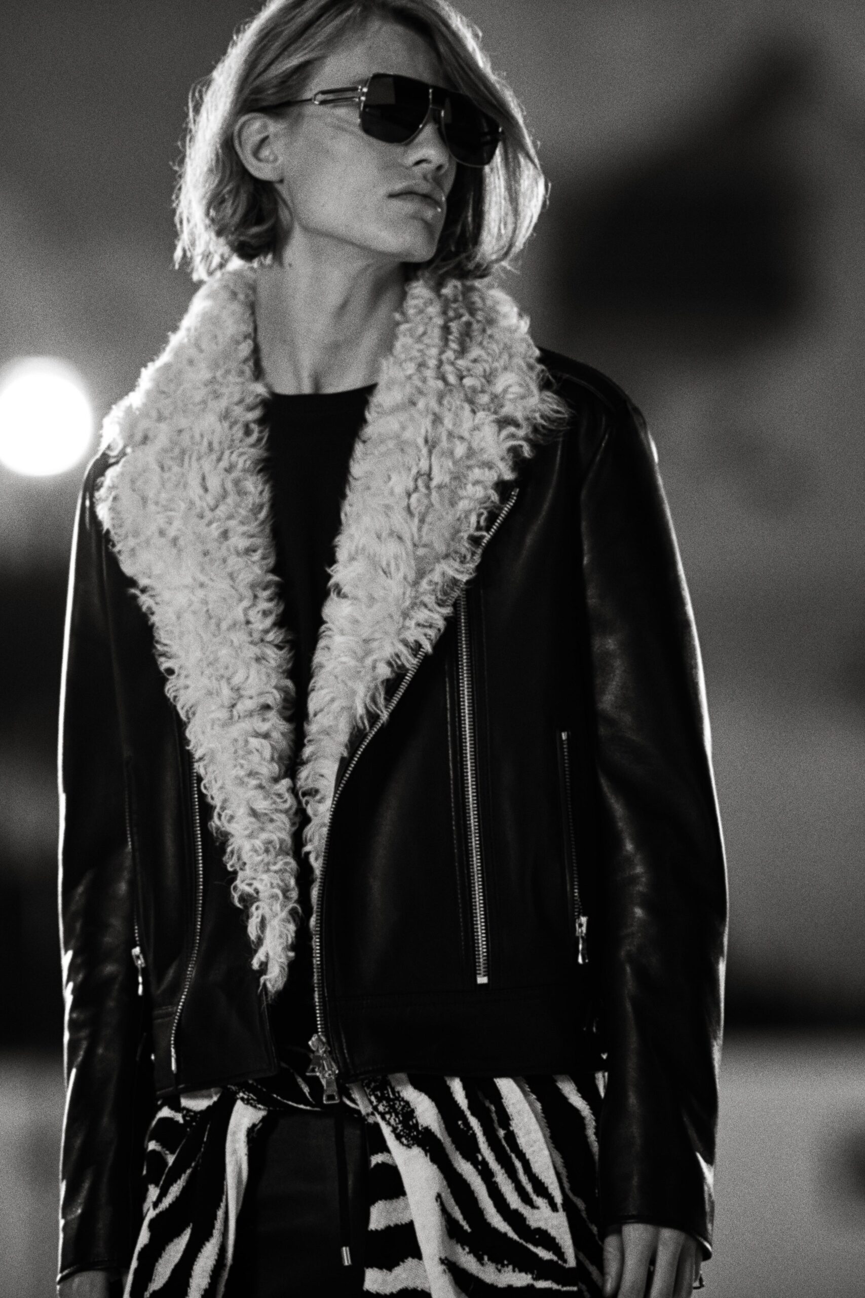 black leather long-sleeve collared fitted zippered fringed jacket