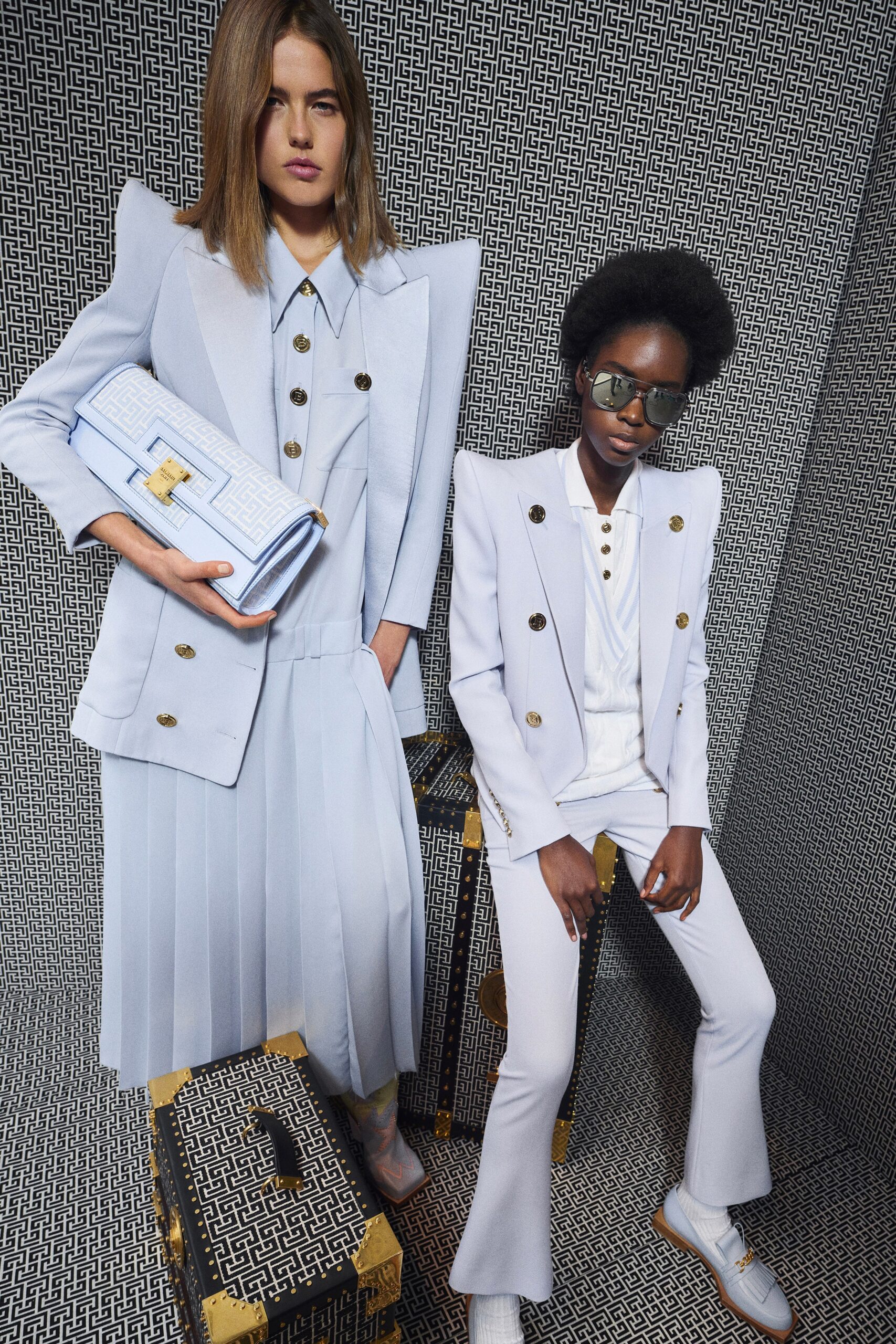 light blue pleated dress and white suit