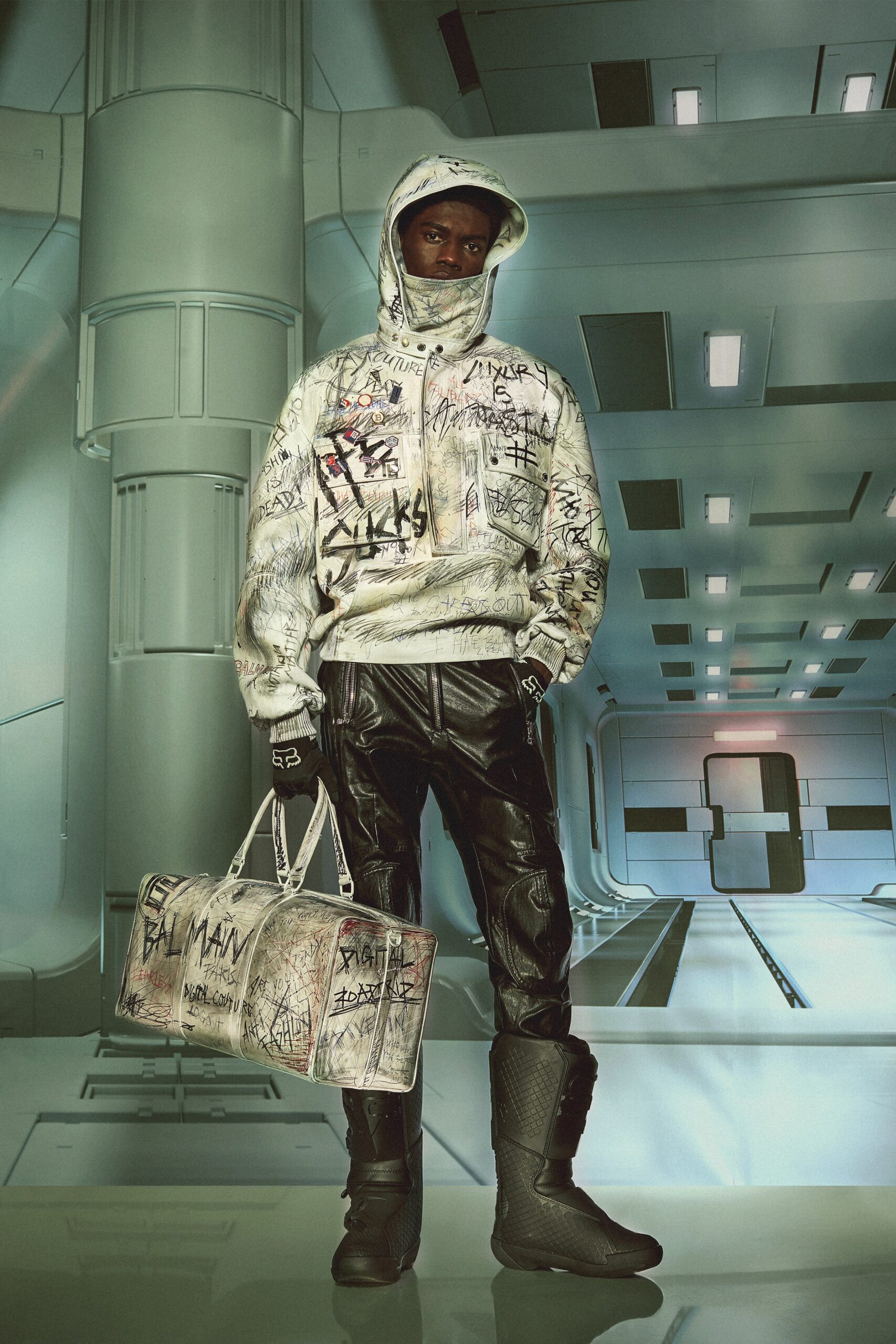 white printed hoodie with black leather pants