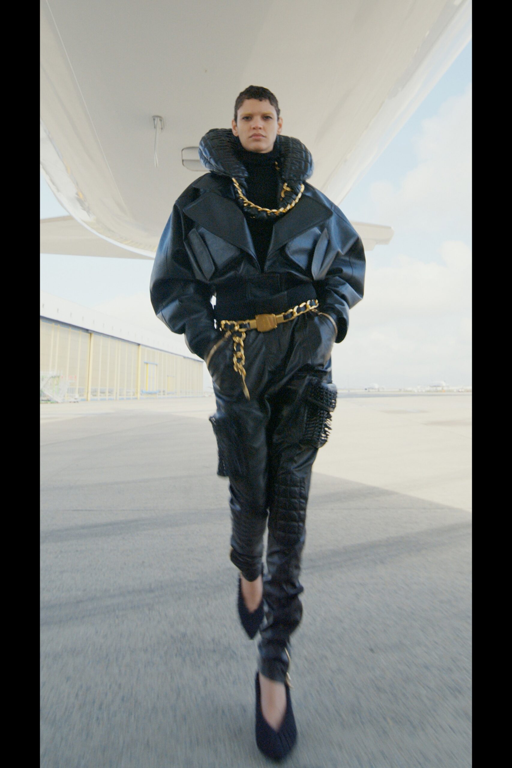 black leather long-sleeve collared oversized padded jacket