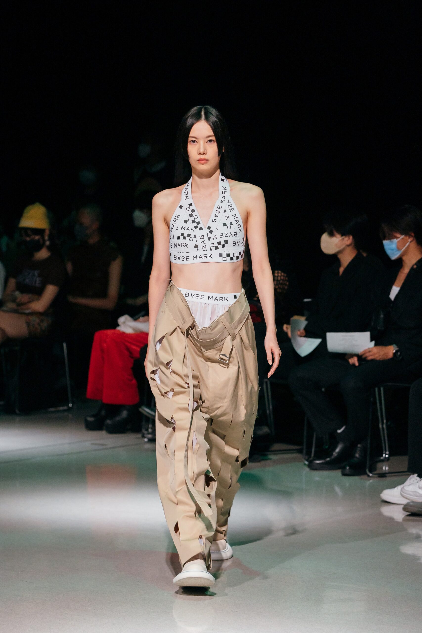 white fitted top and beige cargo pants