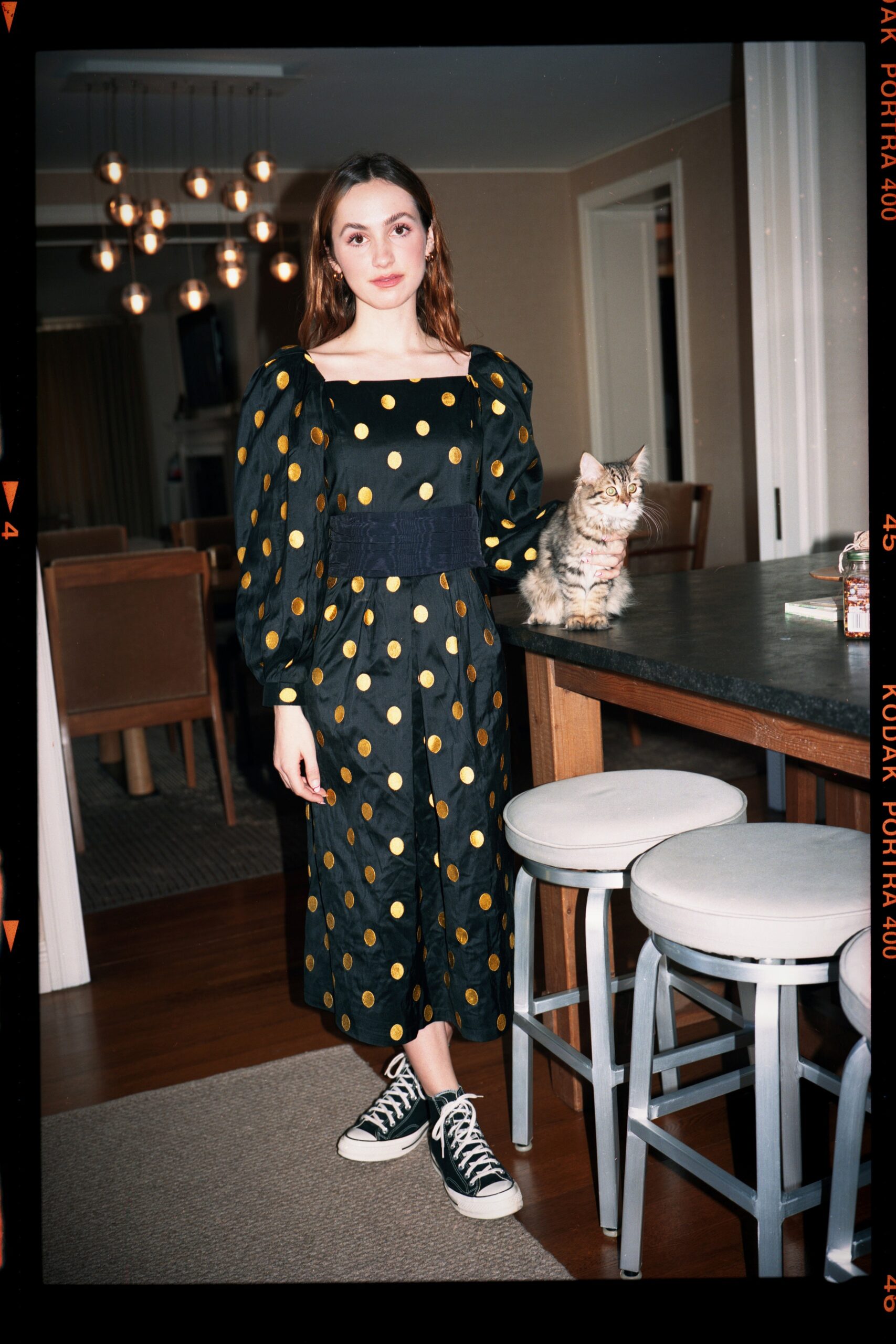 black polka-dot midi dress