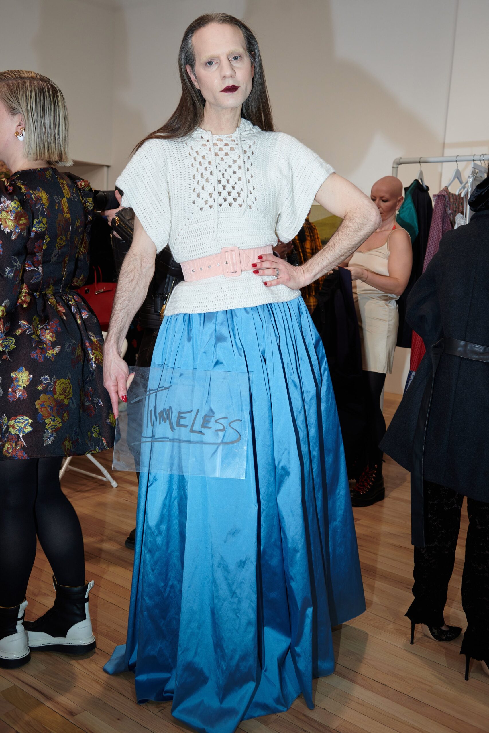 white crochet top blue pleated skirt