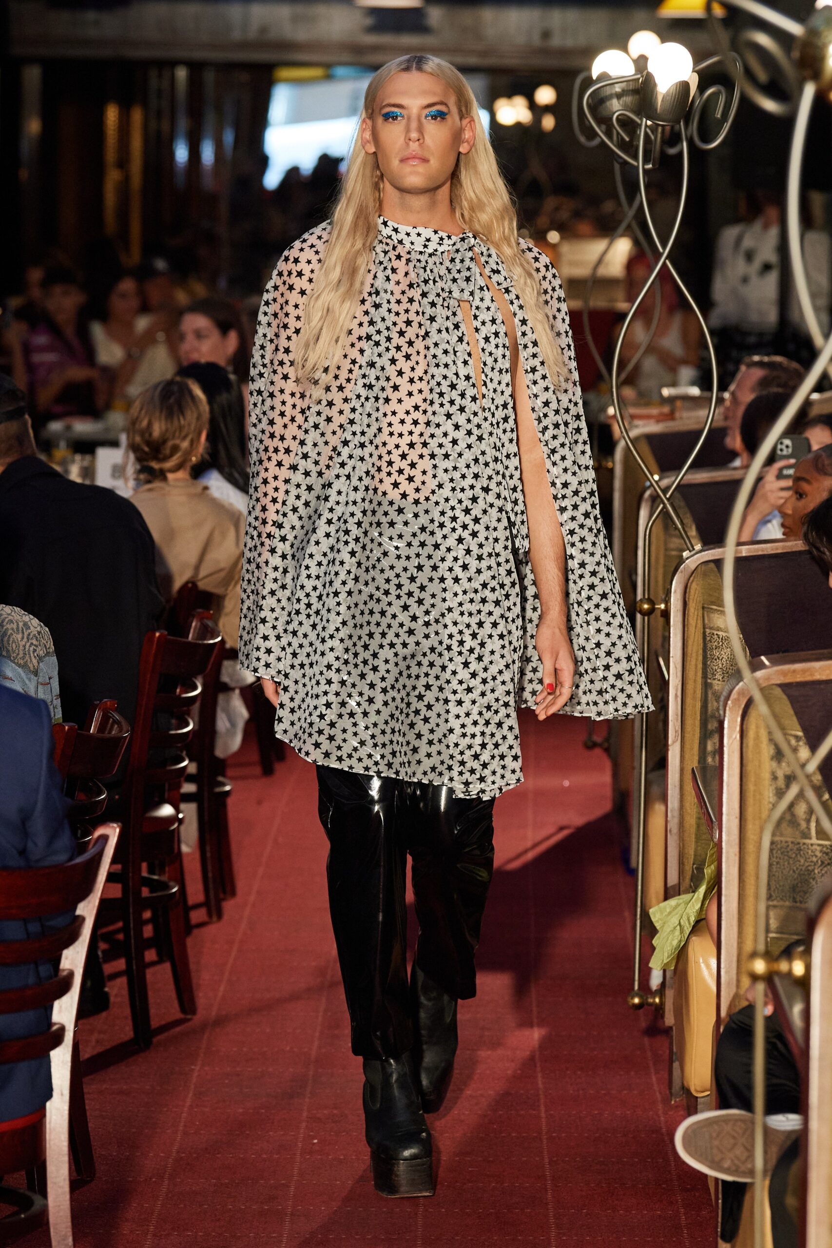 black vinyl pants with printed cape