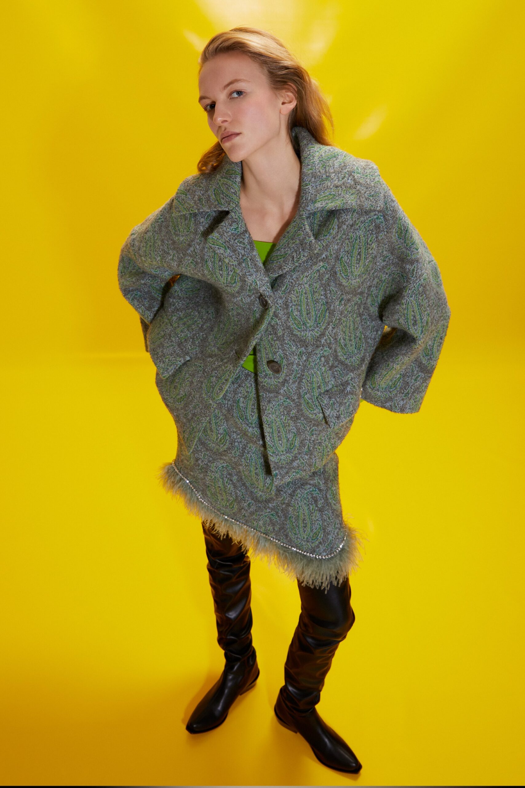 green wool coat with fringes