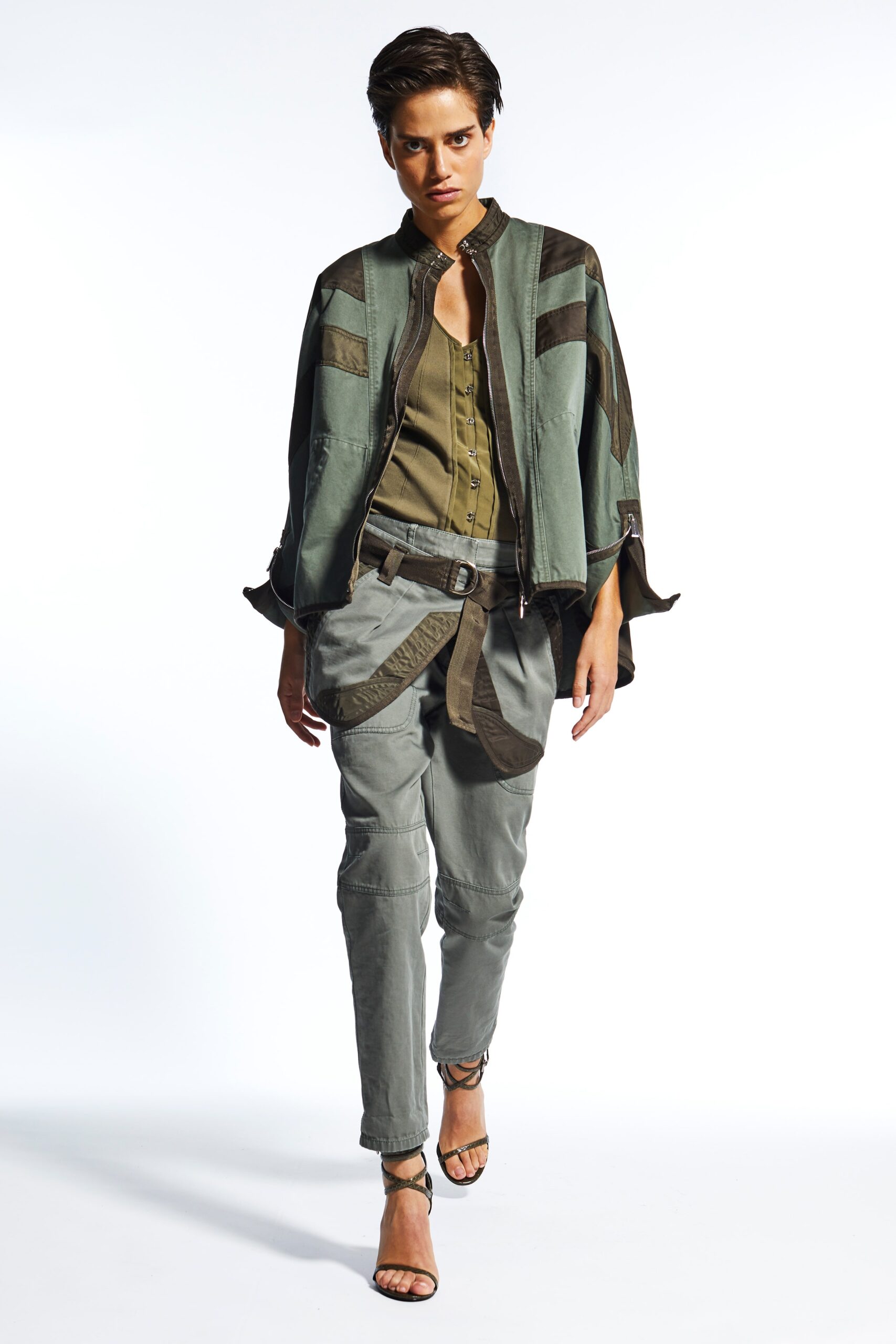 green relaxed jacket with gray pants