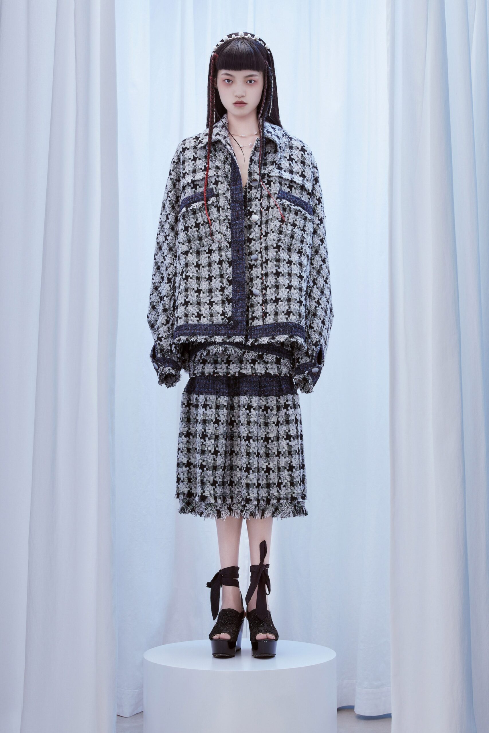 black and white oversized jacket with fringed skirt