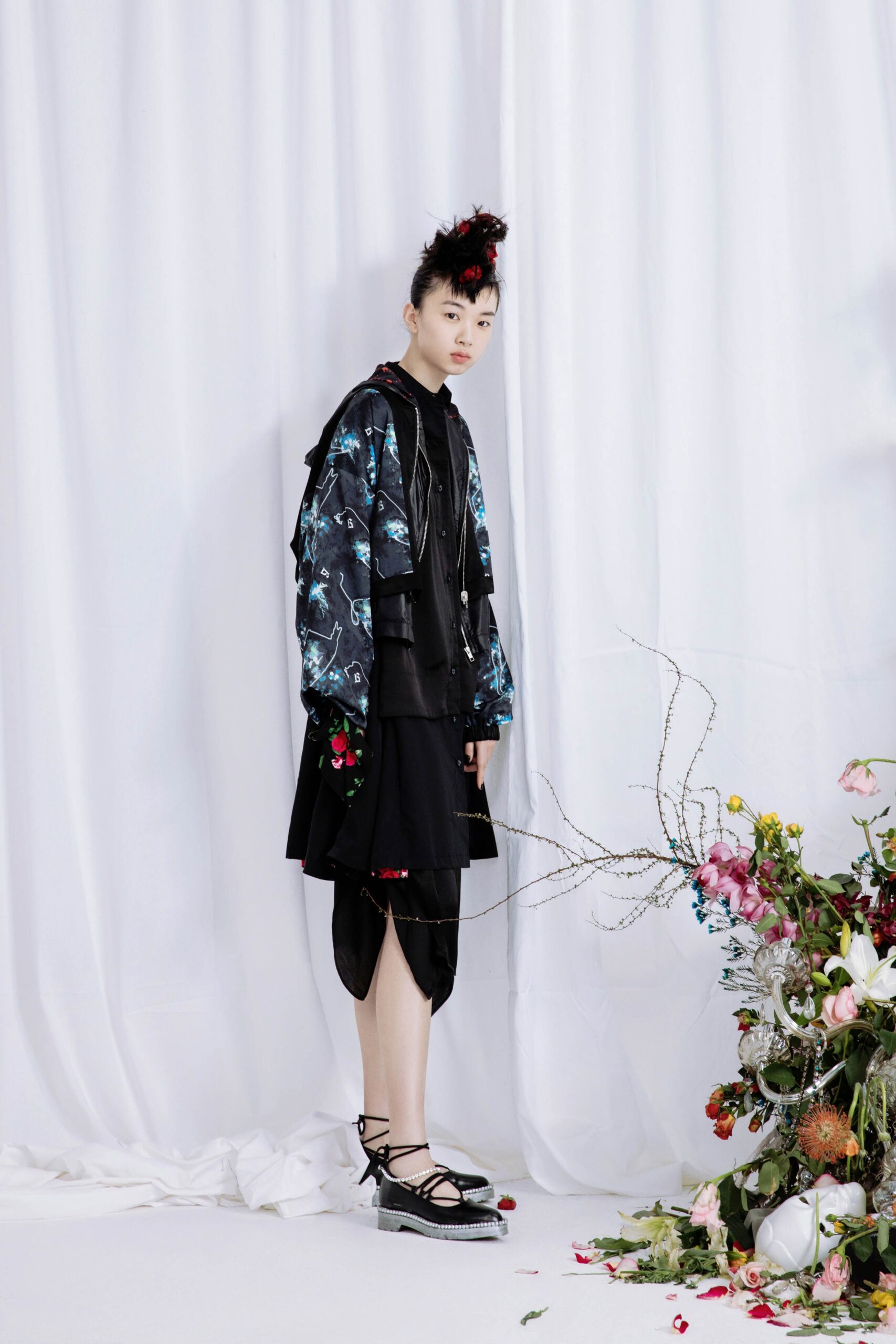 black layered top with asymmetric skirt