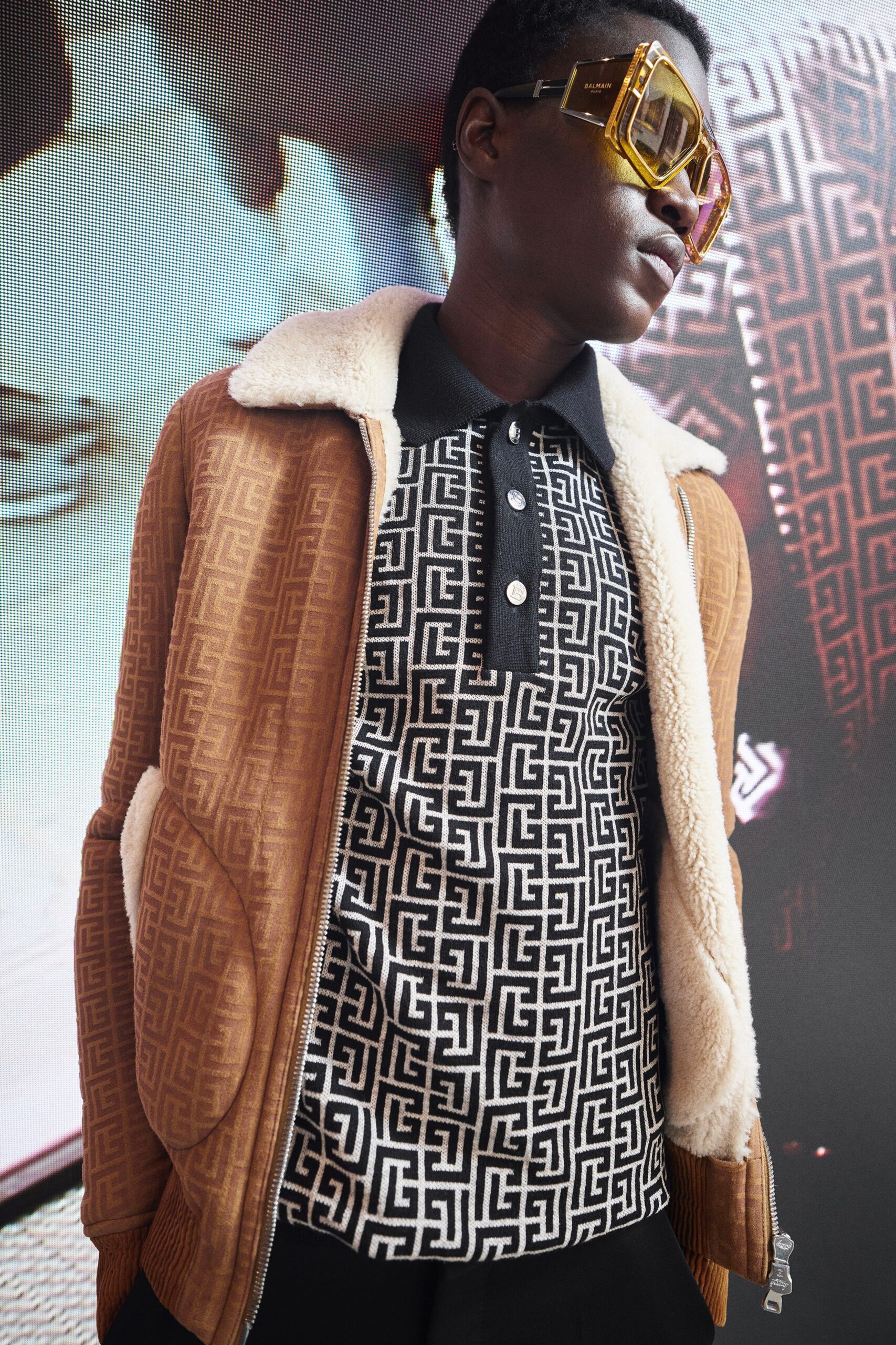 brown relaxed jacket and black printed shirt
