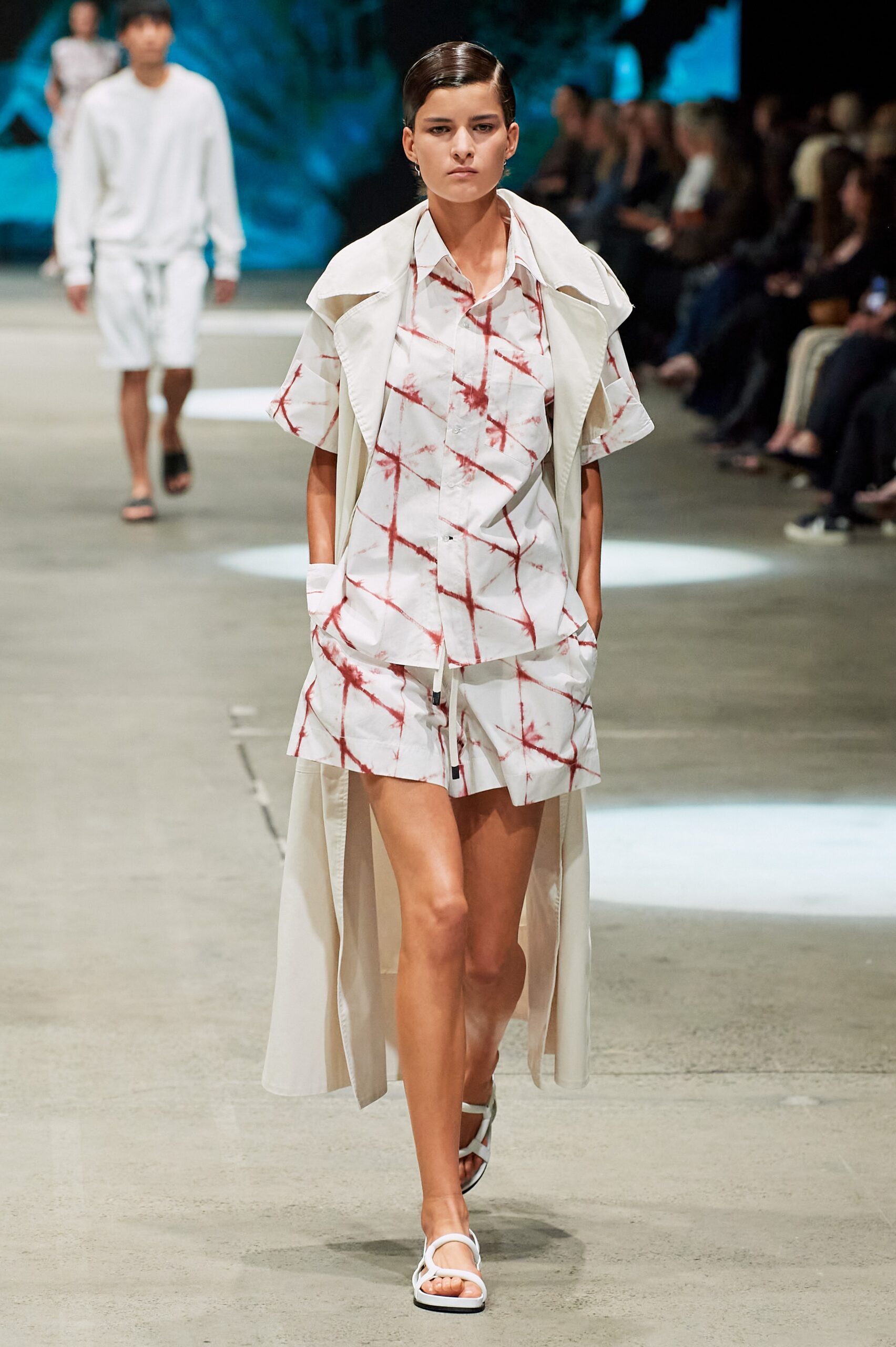 white relaxed coat with printed shirt and shorts