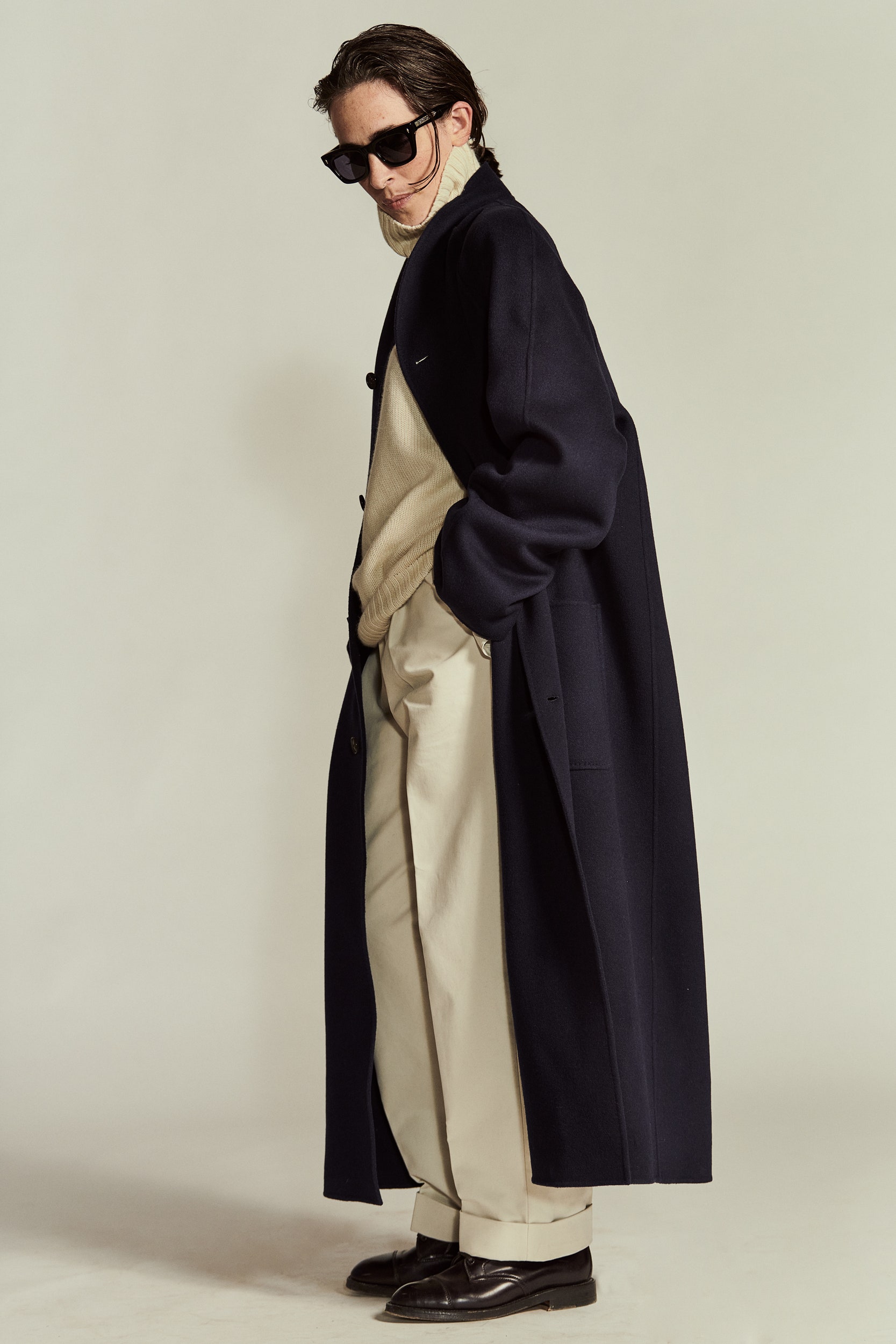 beige wool long-sleeve high-neck relaxed sweater