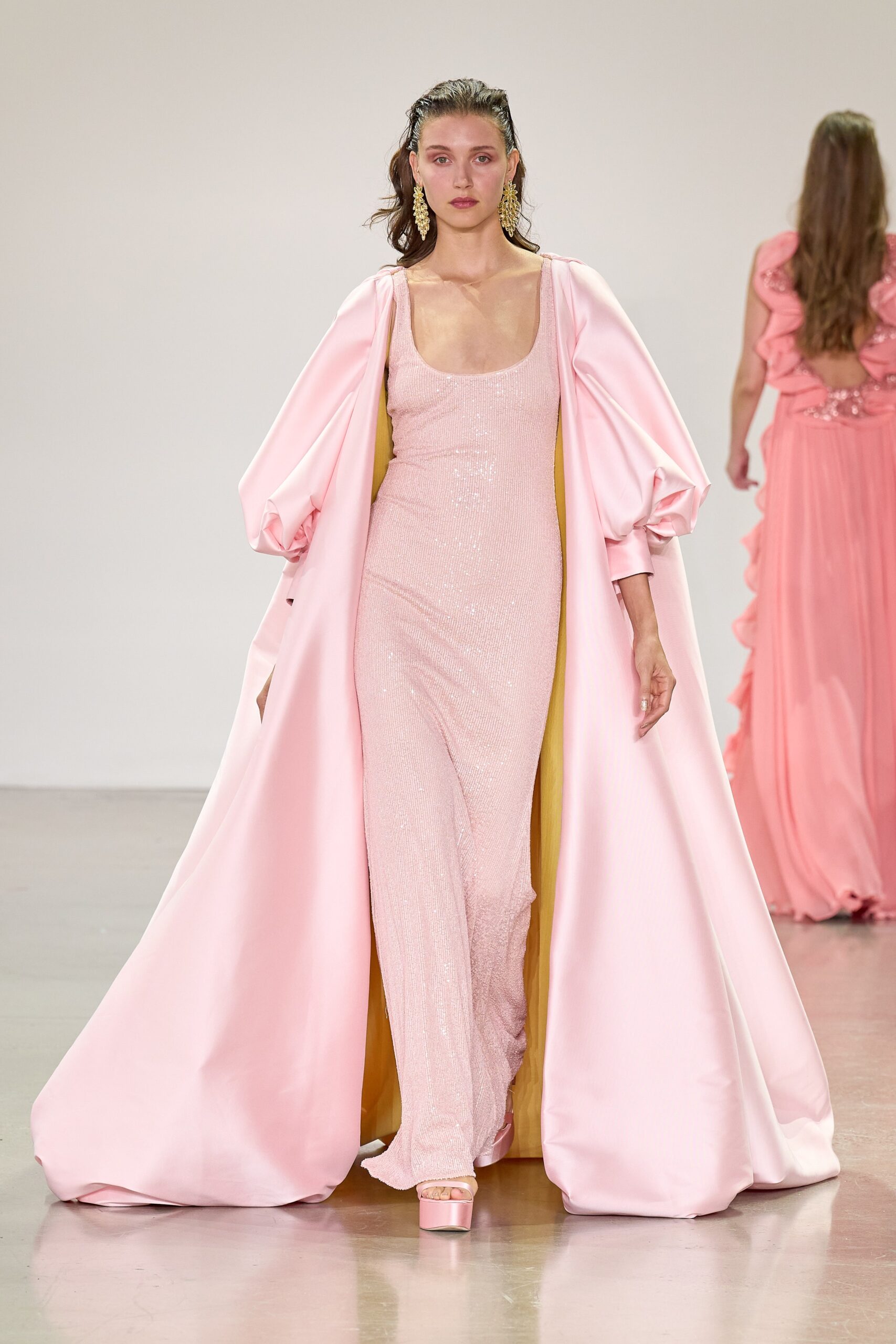 pink sequined gown with cape