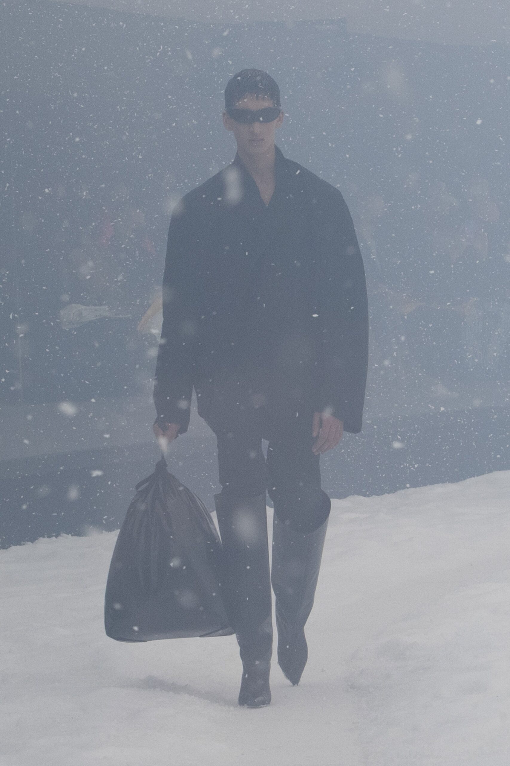 oversized black coat with vinyl pants