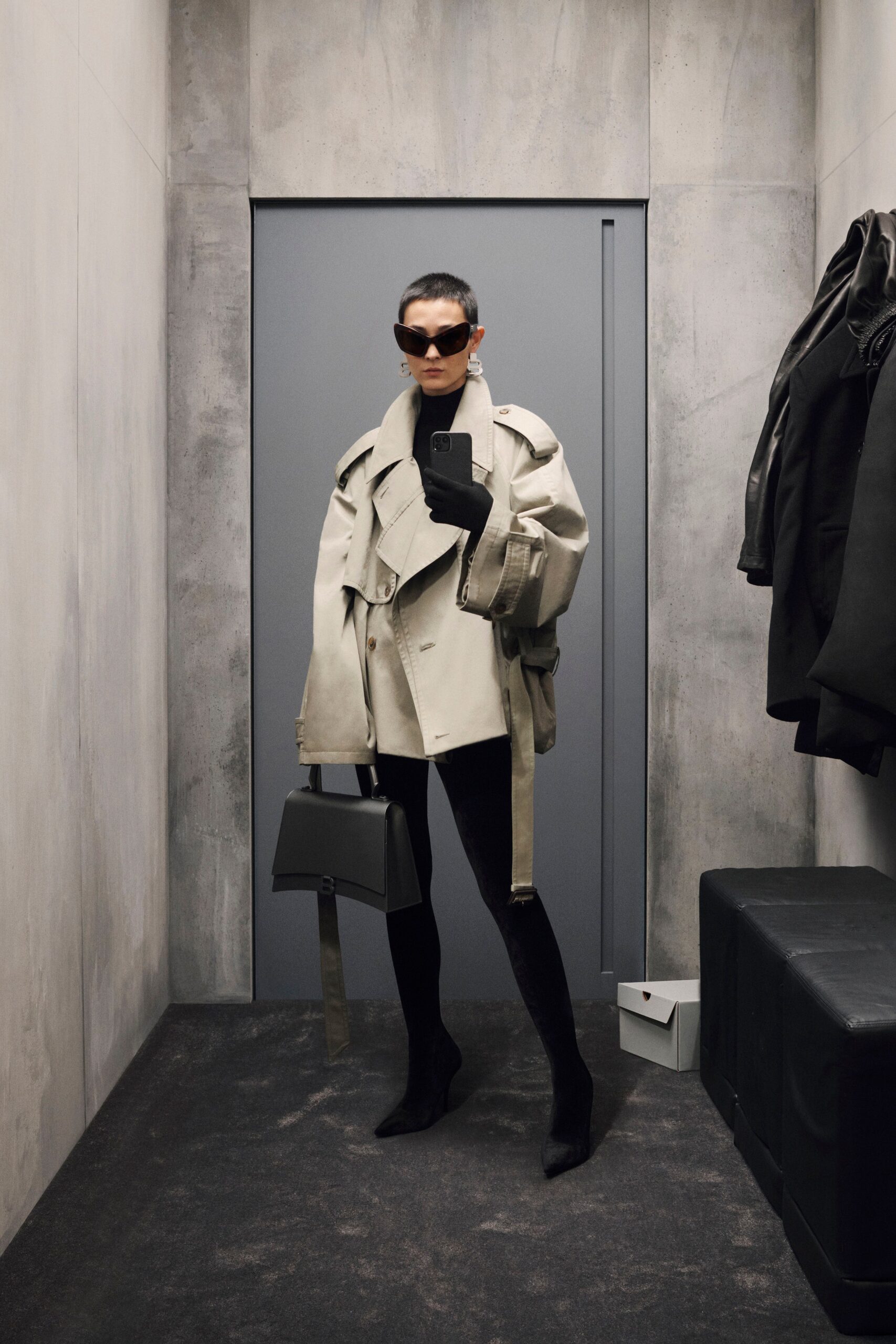 oversized beige coat with black pants