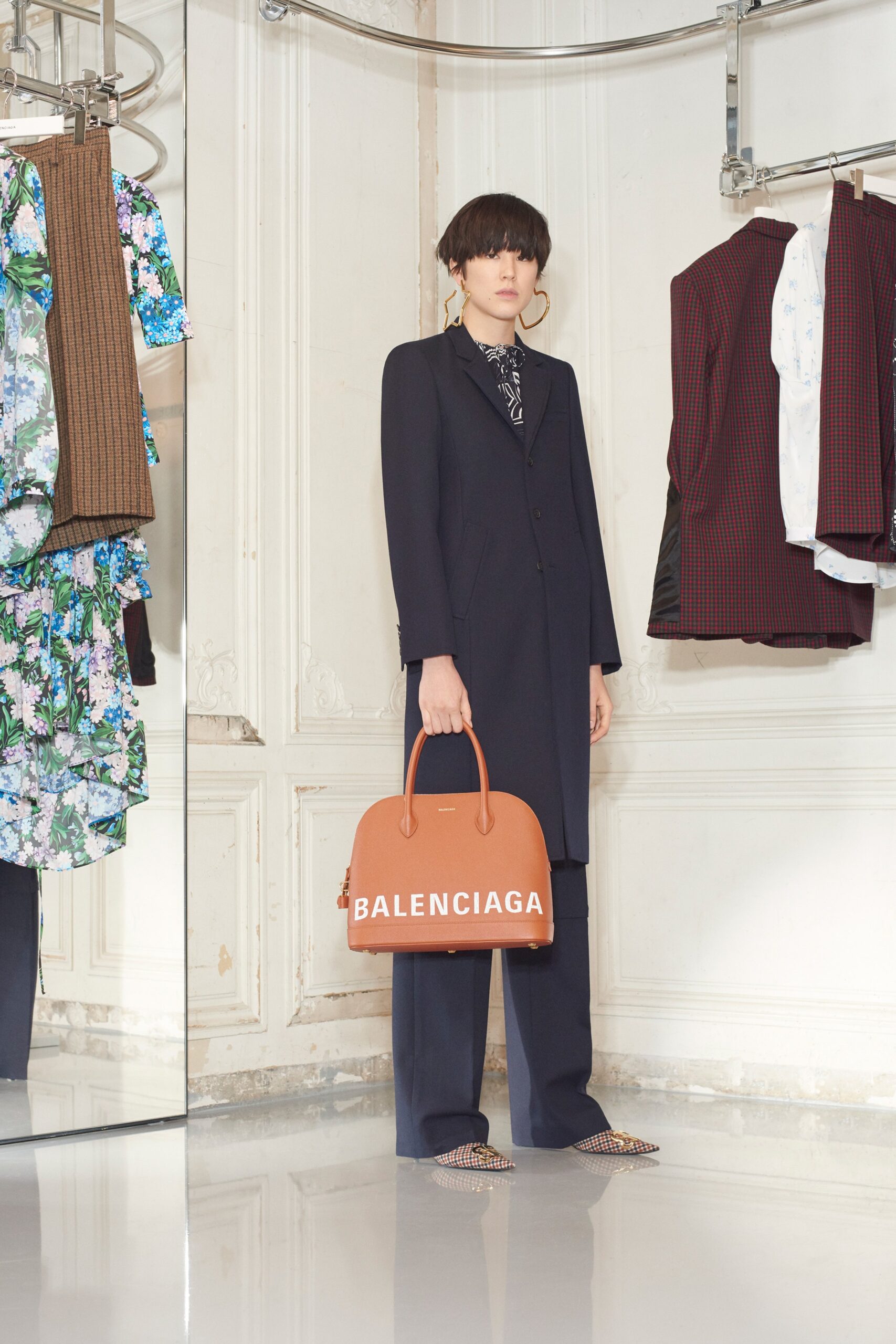 black long-sleeve collared tailored straight-leg coat