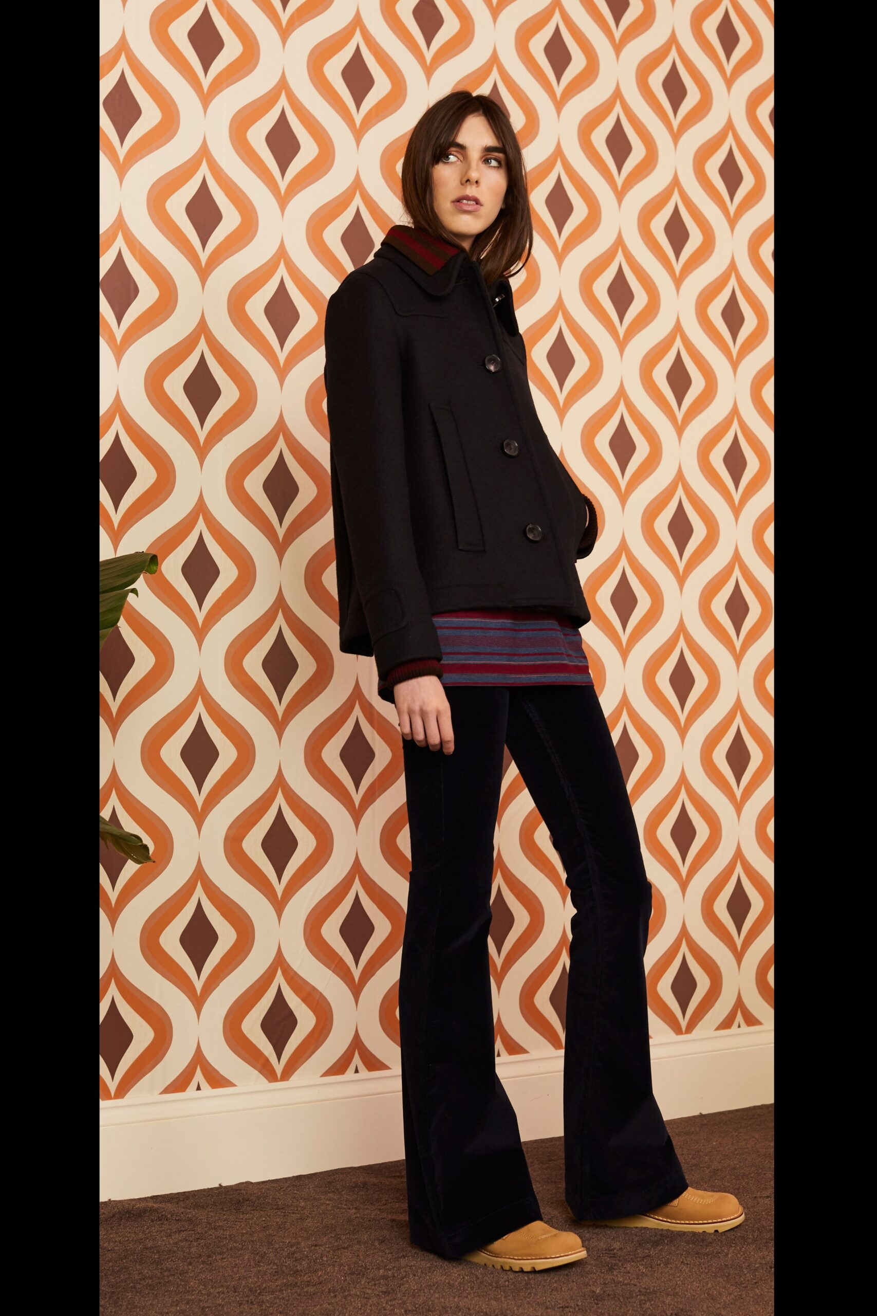 black wool jacket with flared pants