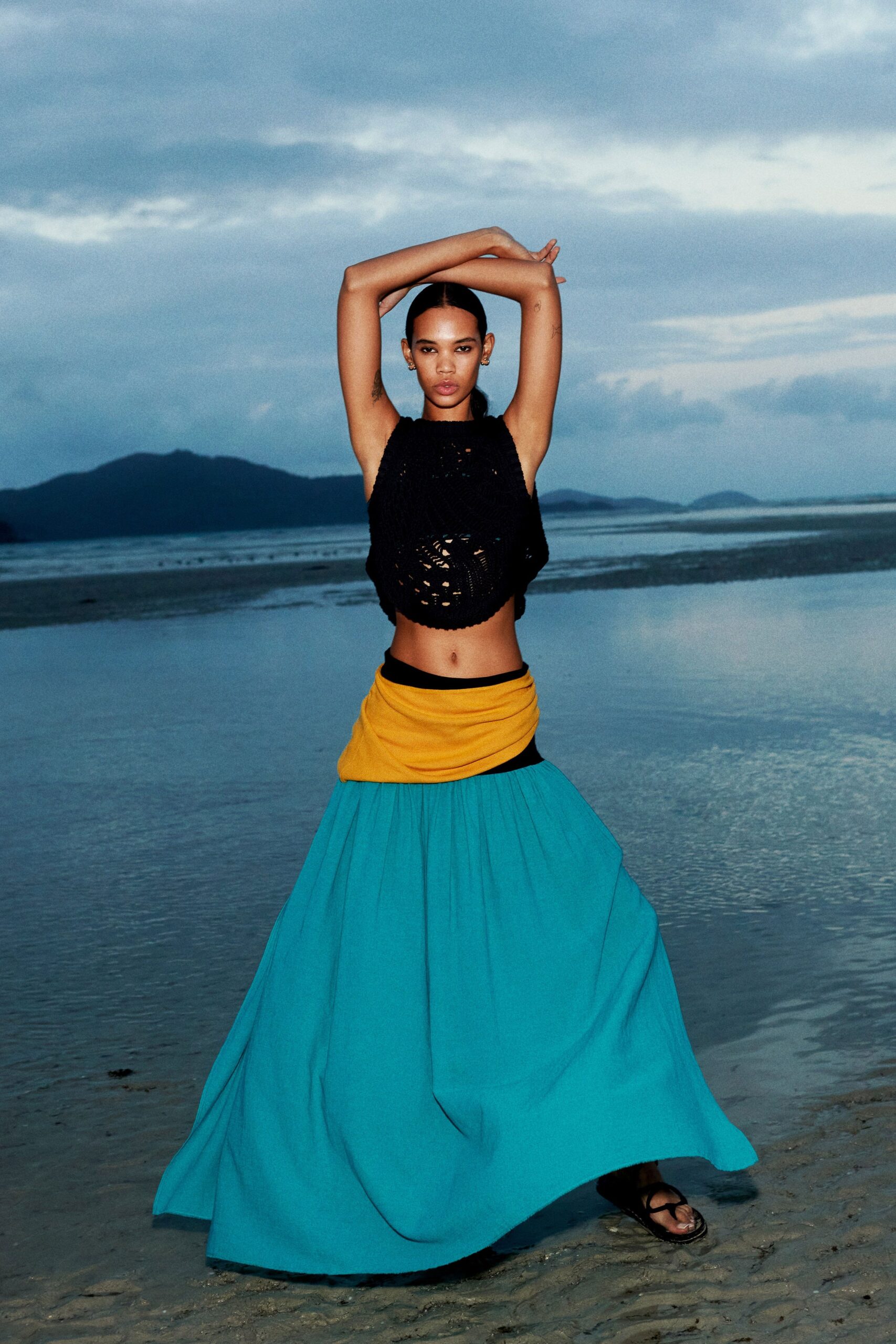 black crochet top with layered skirt