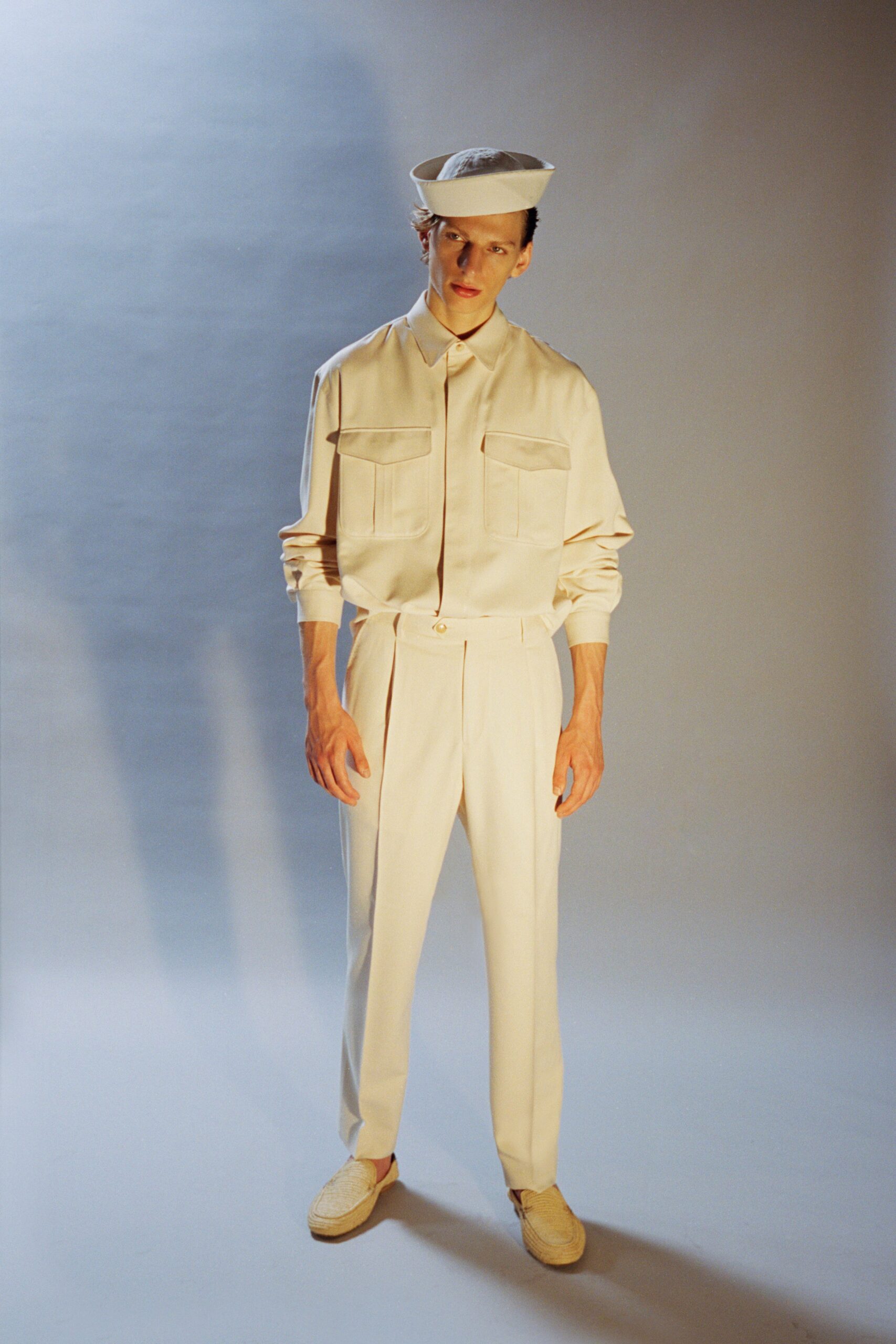 beige relaxed shirt and tailored pants