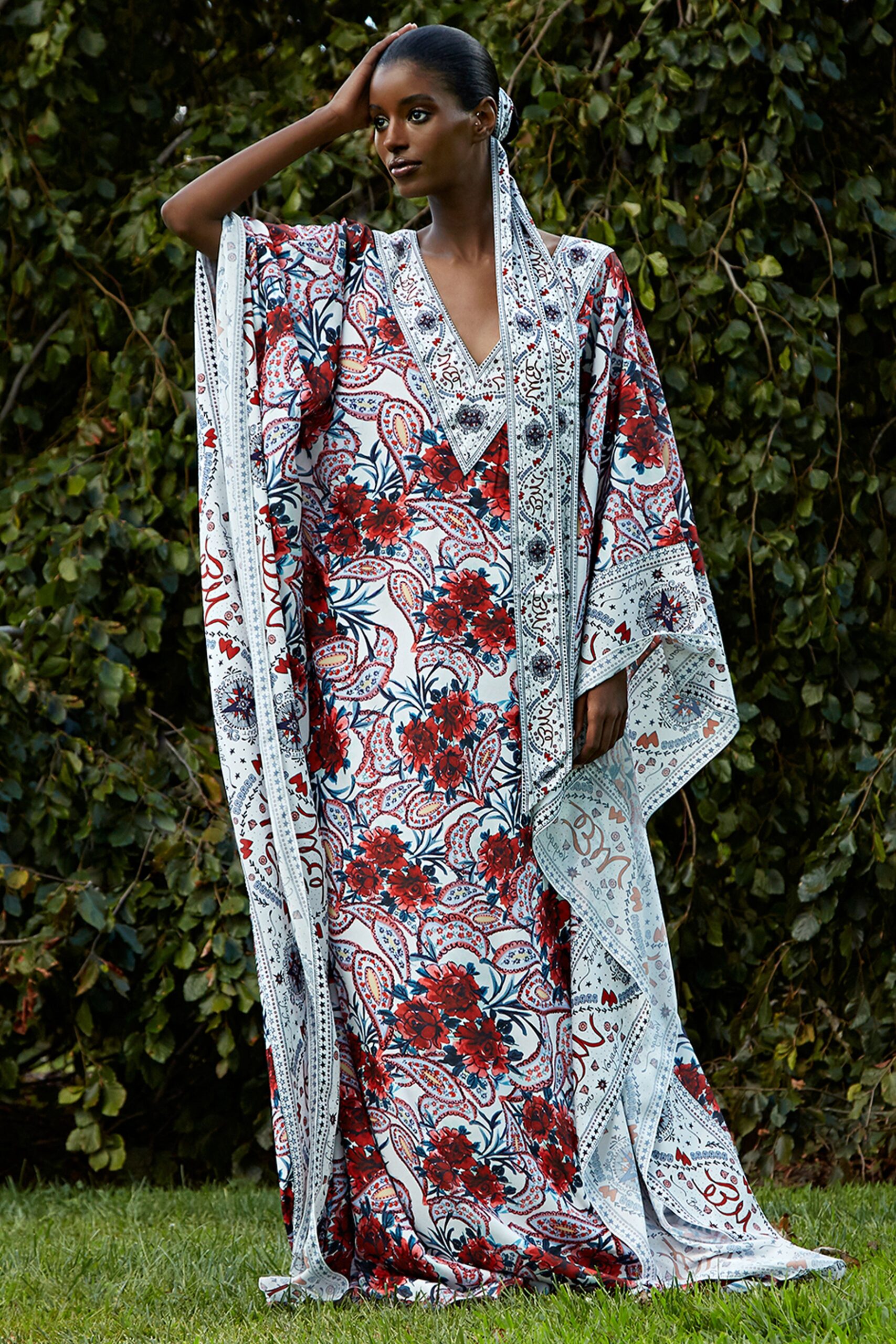 white long-sleeve relaxed floral cape