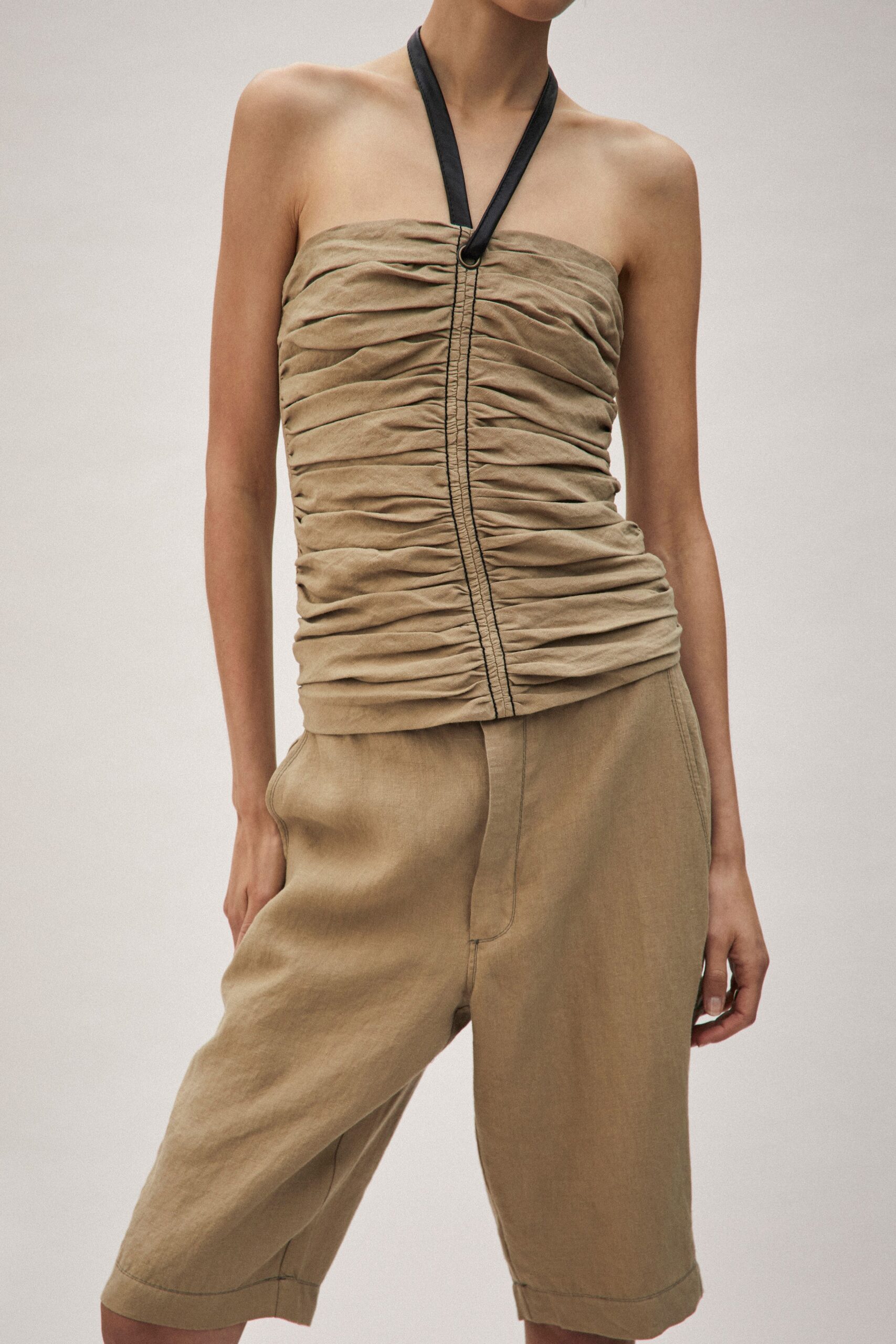 beige ruched strapless top and shorts