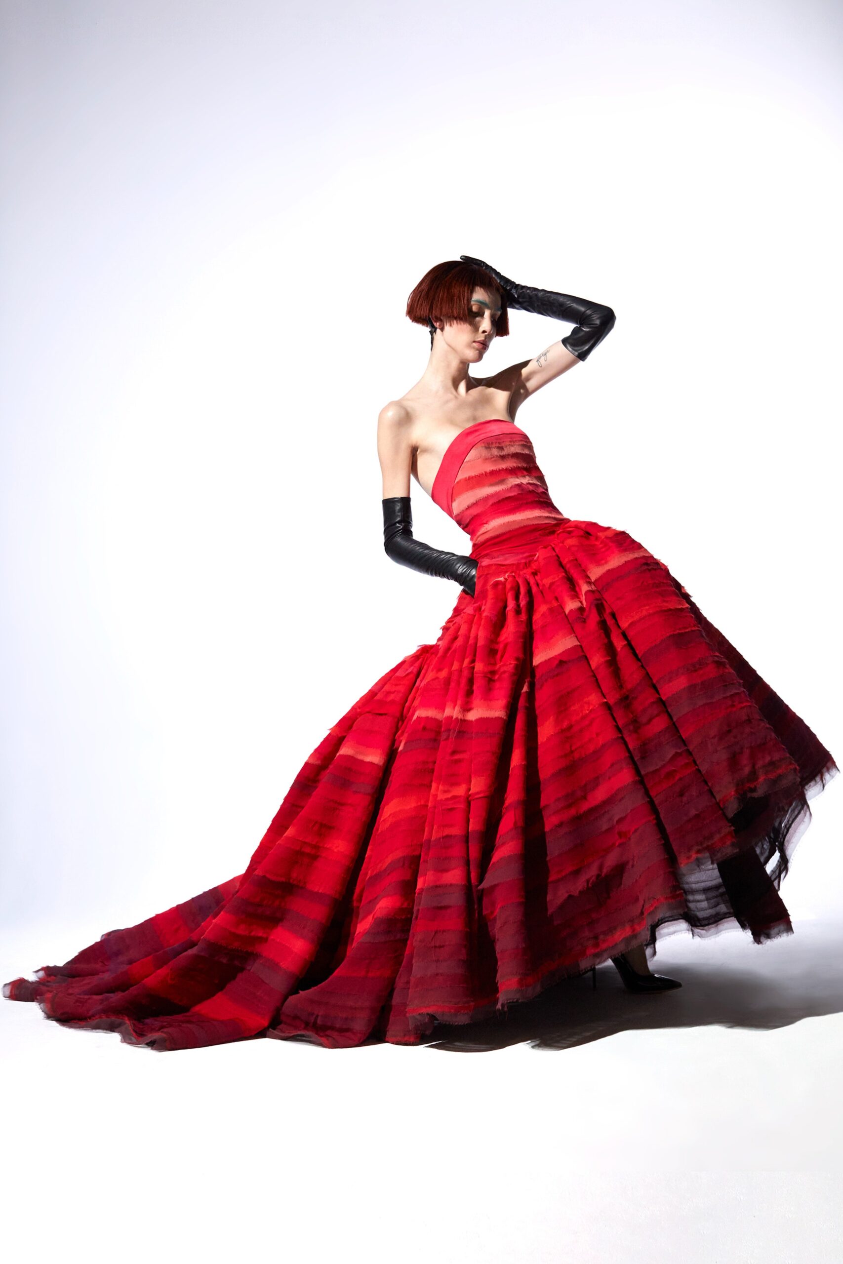 red silk strapless gown