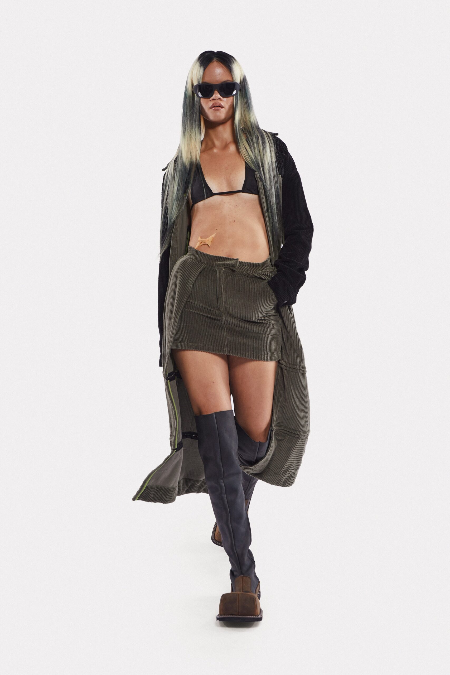 black coat with green mini skirt