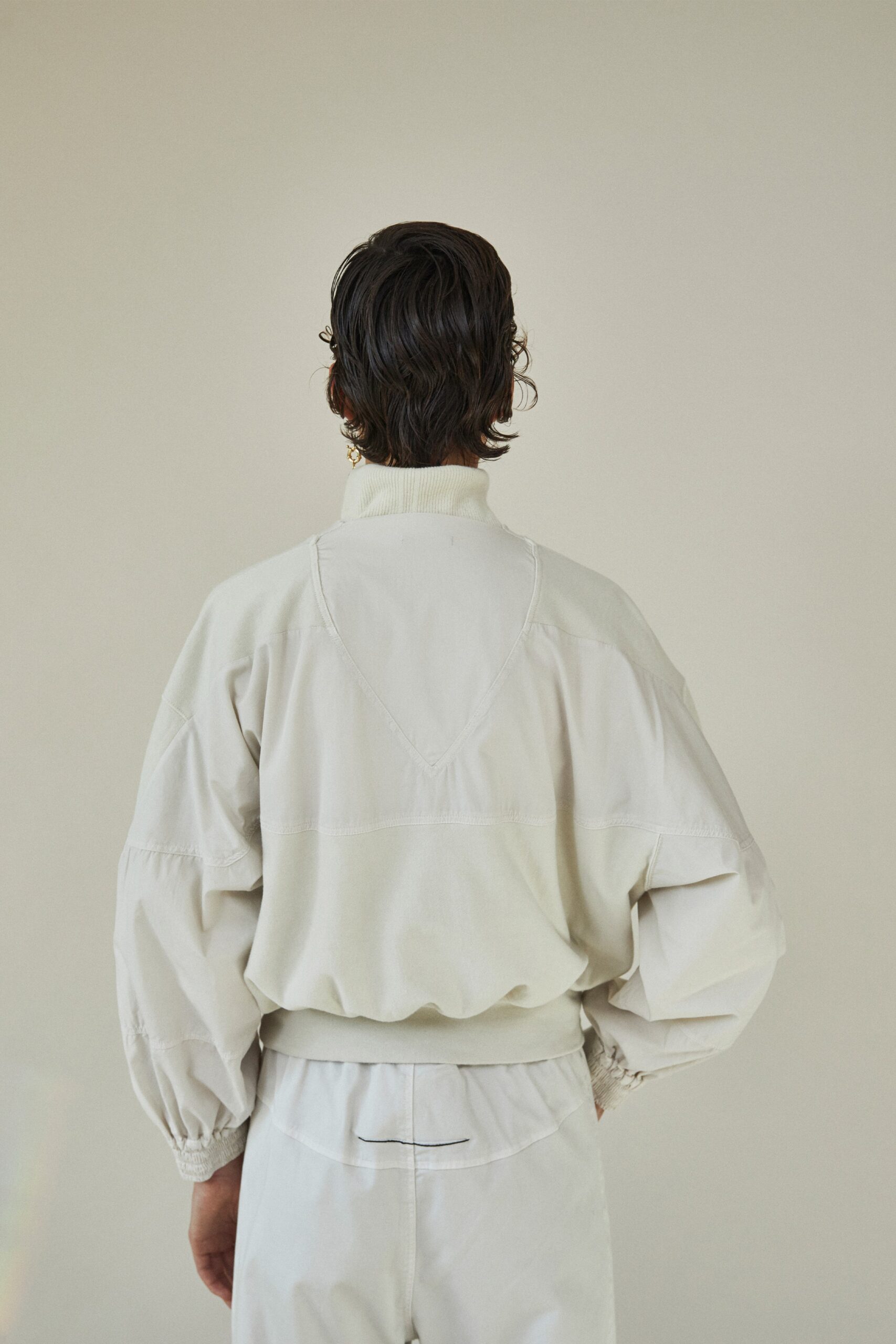 white oversized jacket and relaxed pants