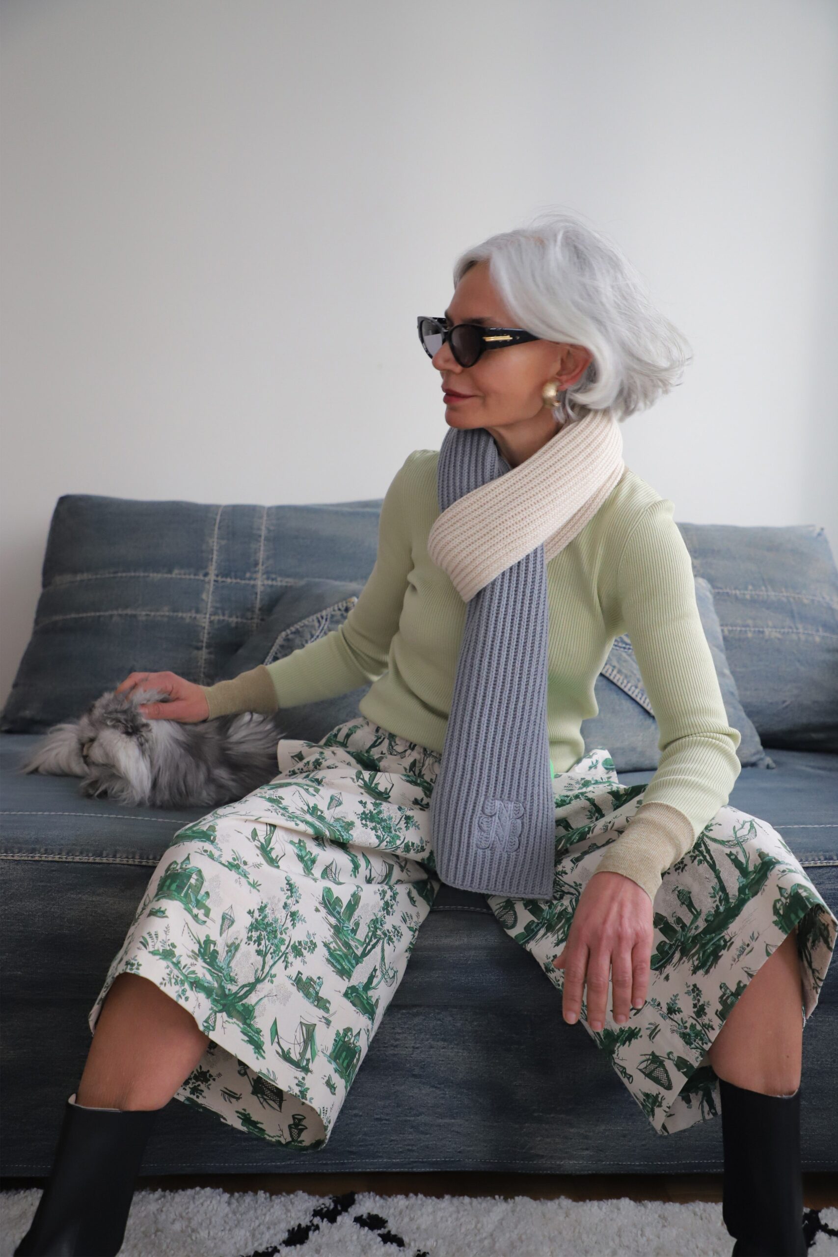 green fitted top with printed midi skirt