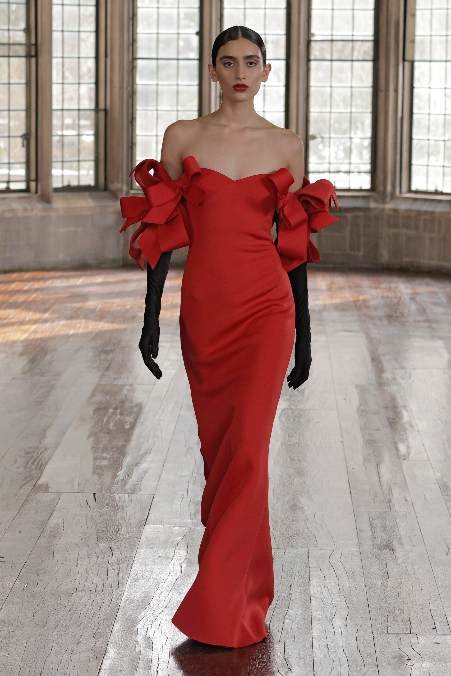red silk strapless gown with gloves