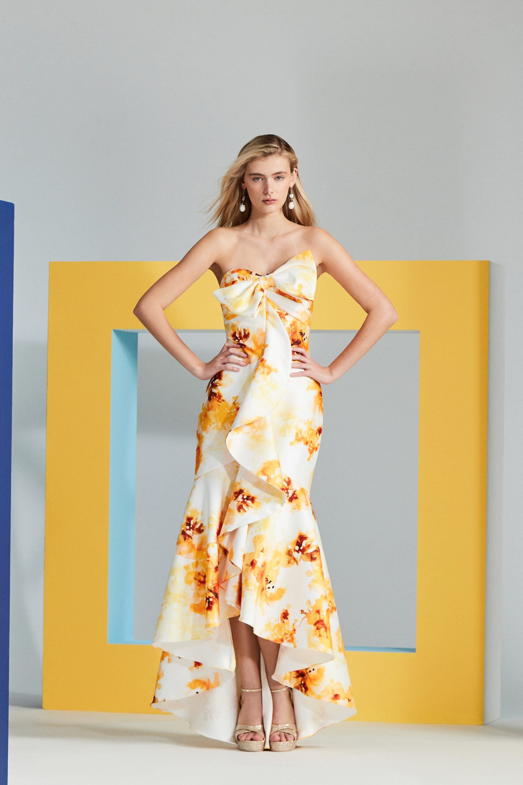 white and yellow ruffled gown