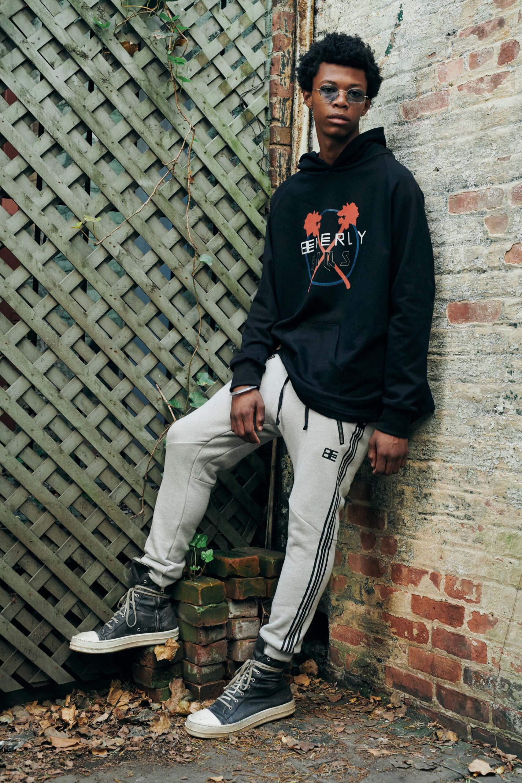 black hoodie with gray pants