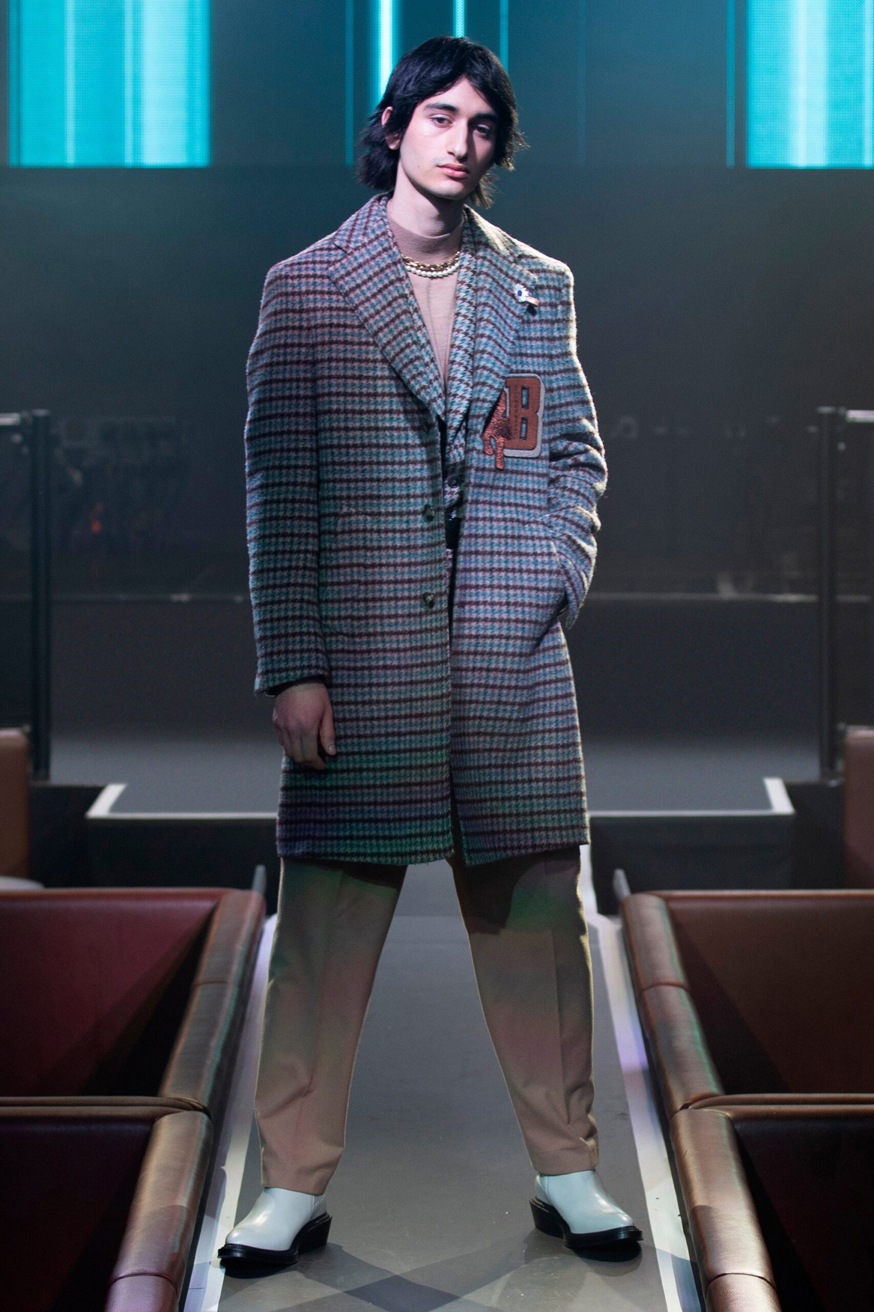 gray checked tailored coat with beige pants