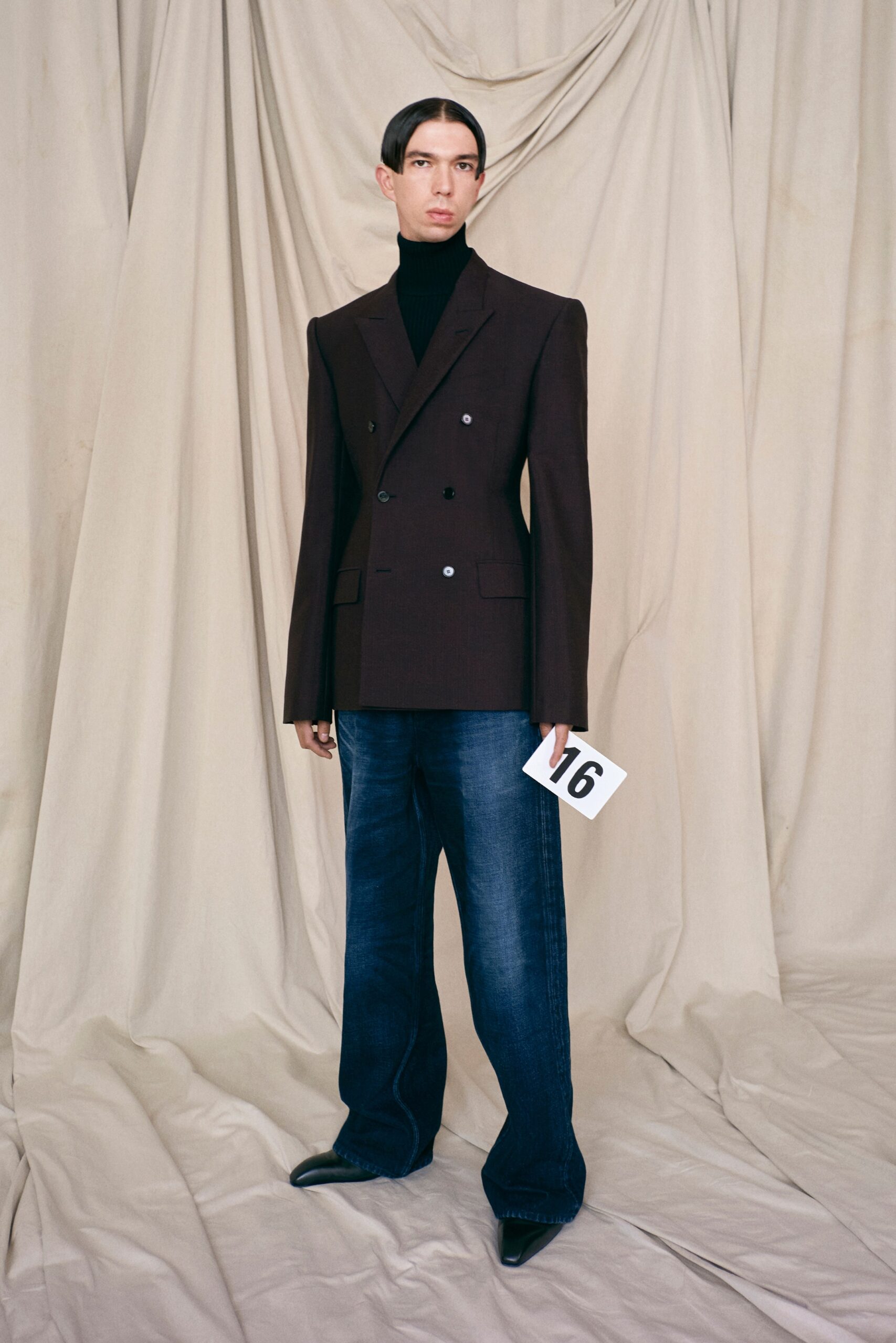 brown tailored blazer with denim pants
