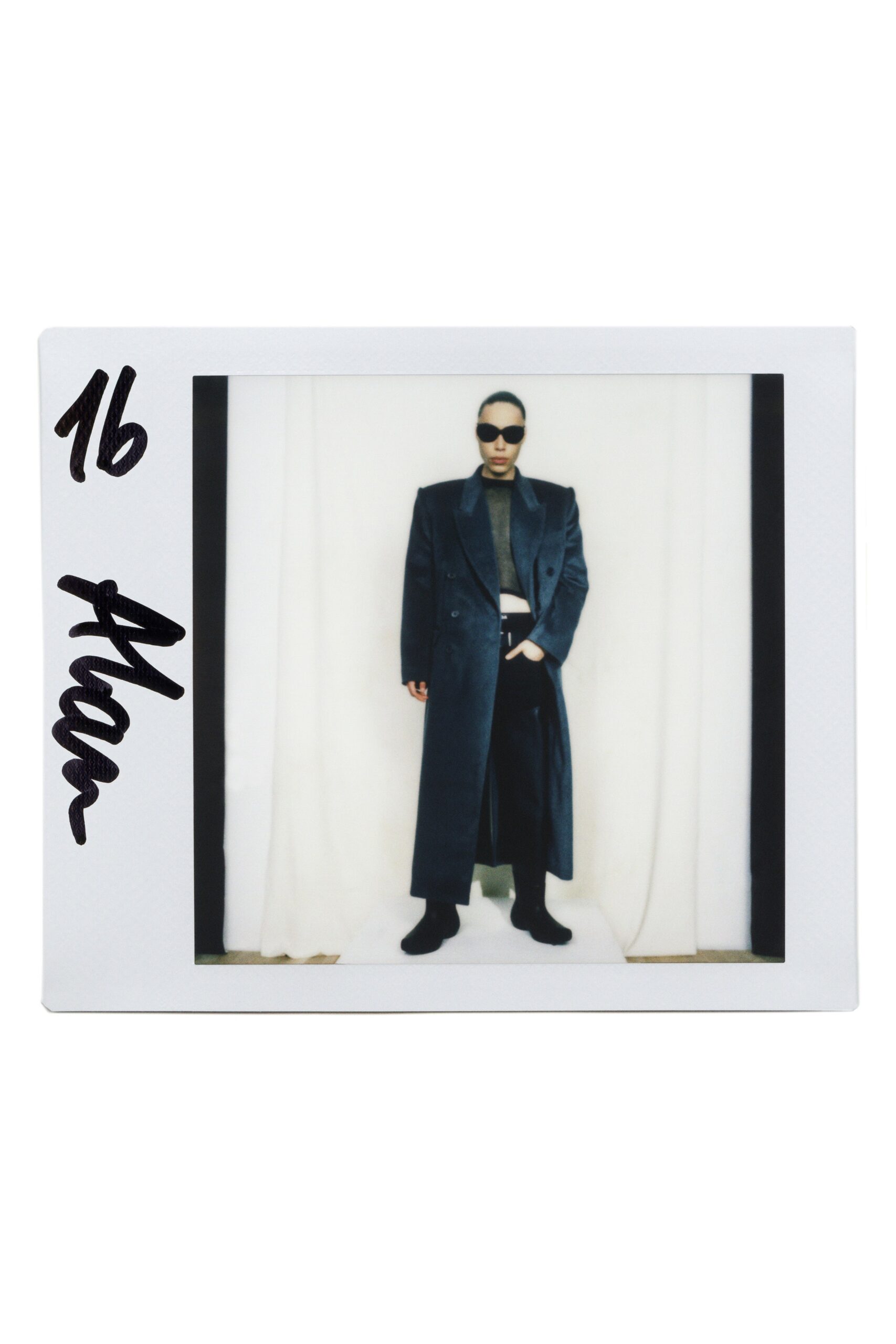 black wool long-sleeve collared tailored buttoned coat