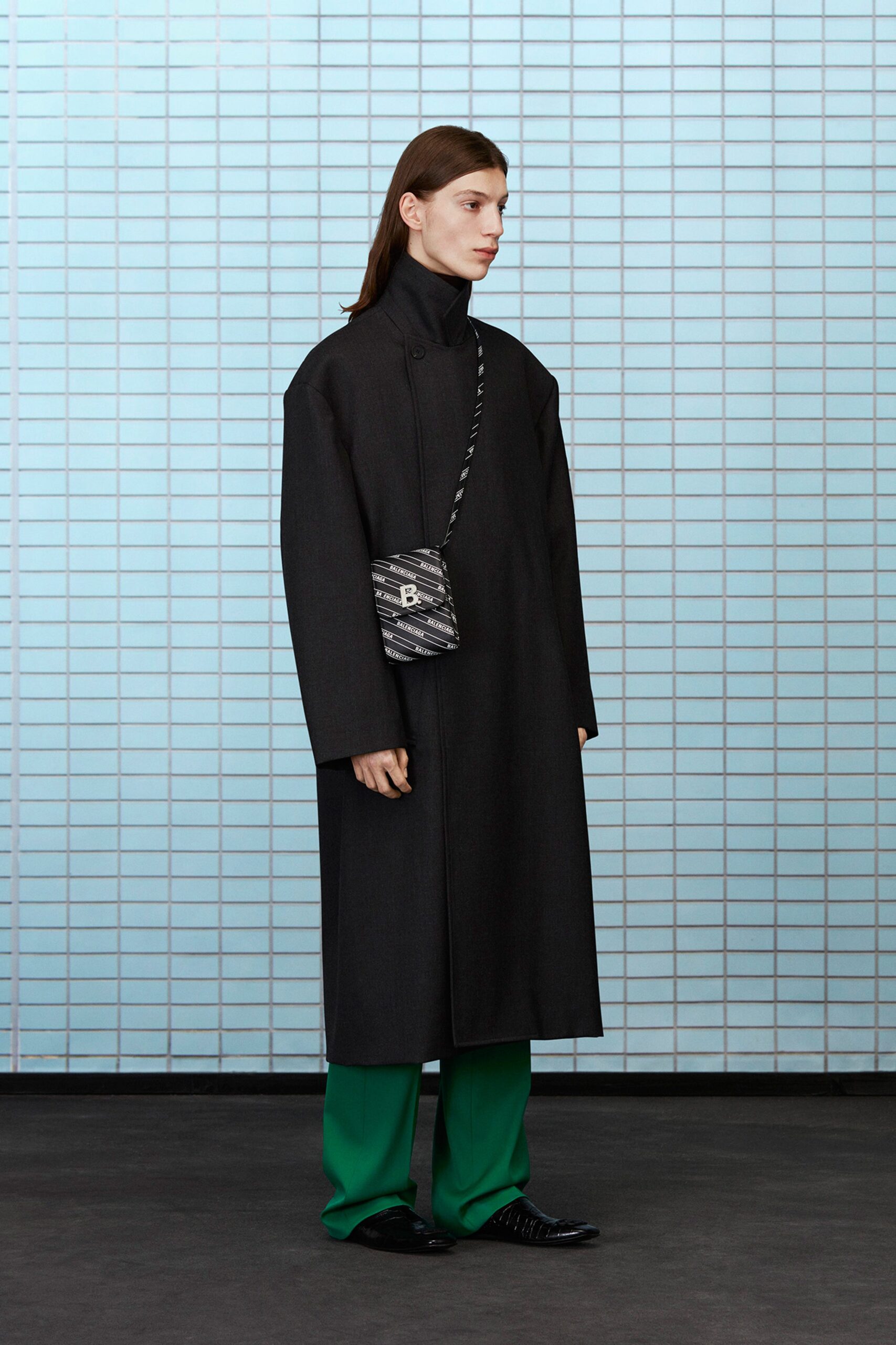black wool long-sleeve collared oversized buttoned coat