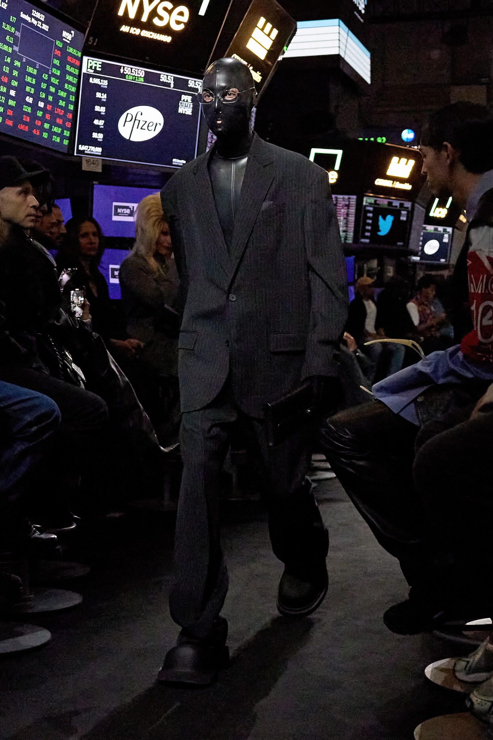 gray tailored suit with black shoes