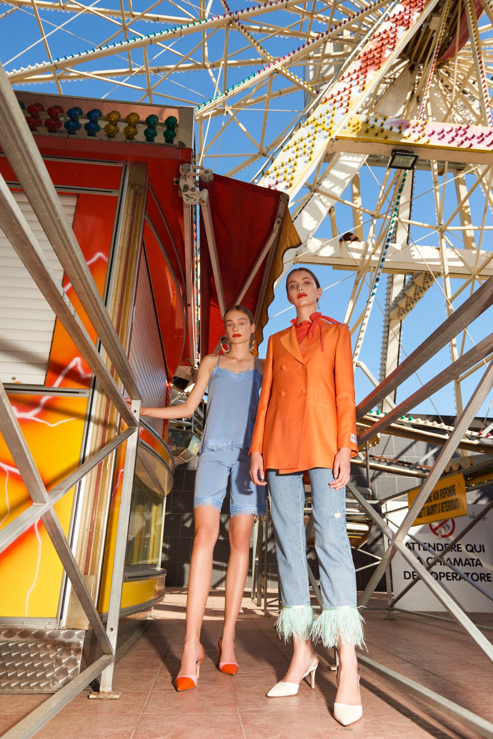 blue blouse orange blazer jeans