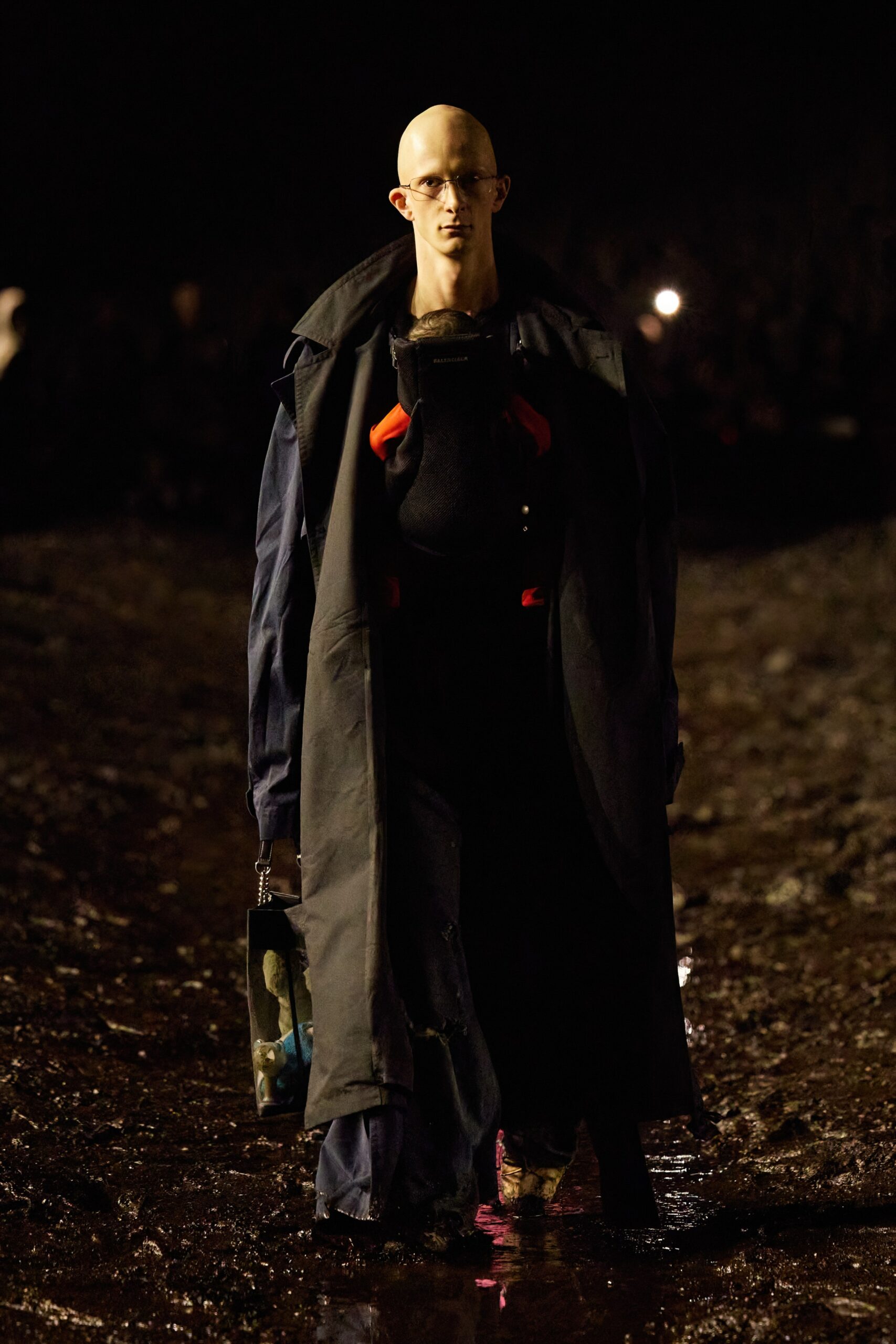 black relaxed coat with fitted jumpsuit