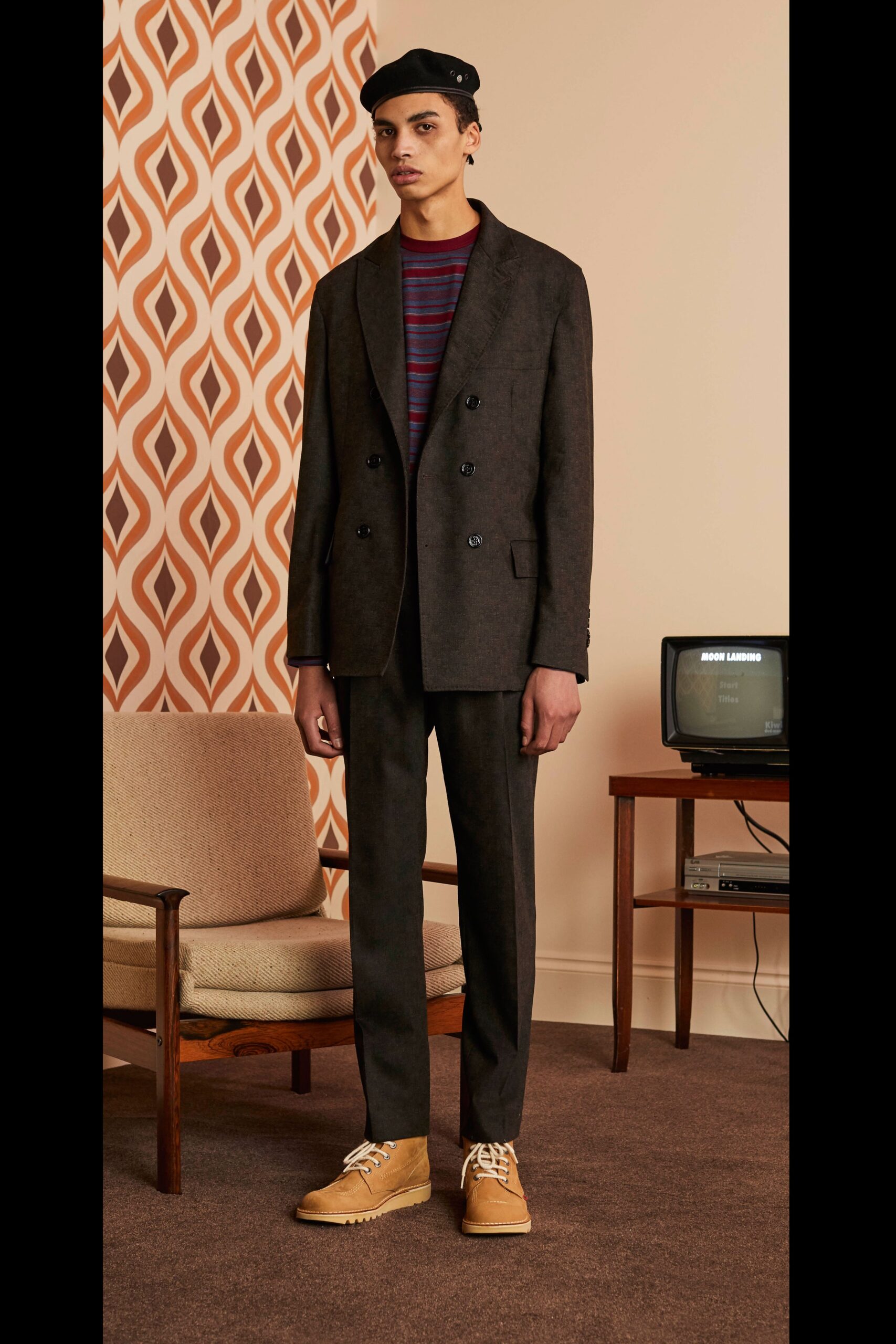 black tailored suit with striped top