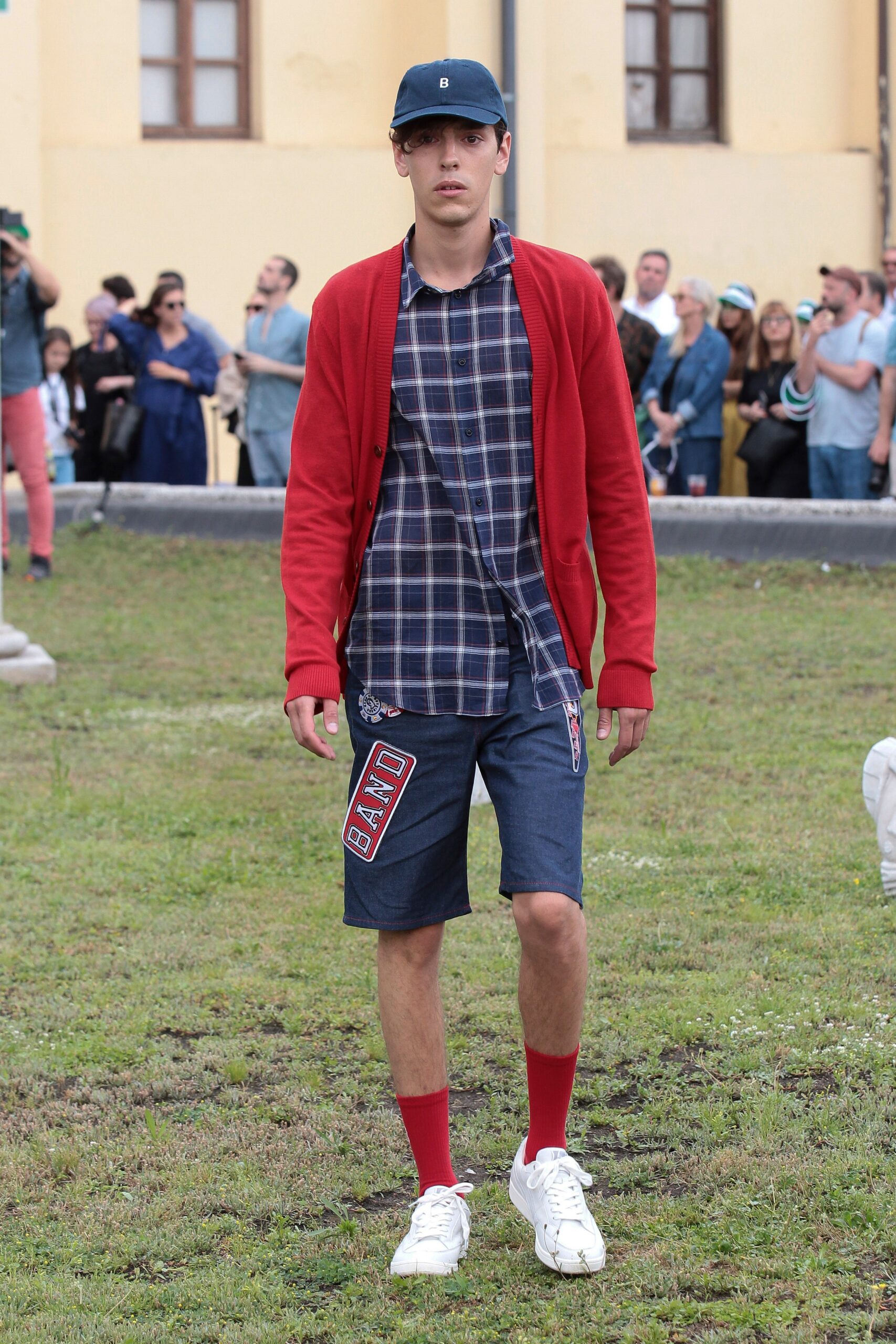 red cardigan with blue checked shirt