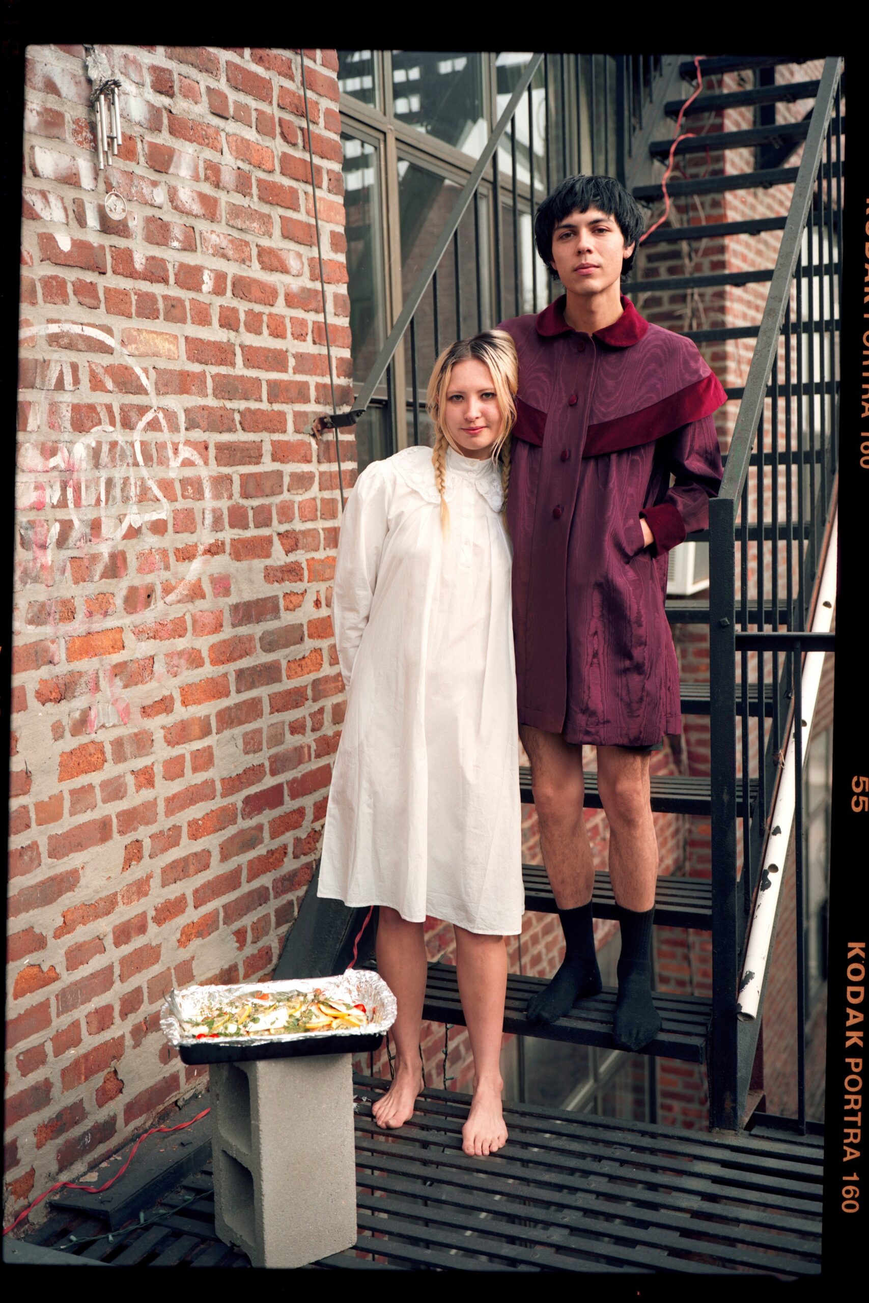 red cotton long-sleeve collared relaxed buttoned coat