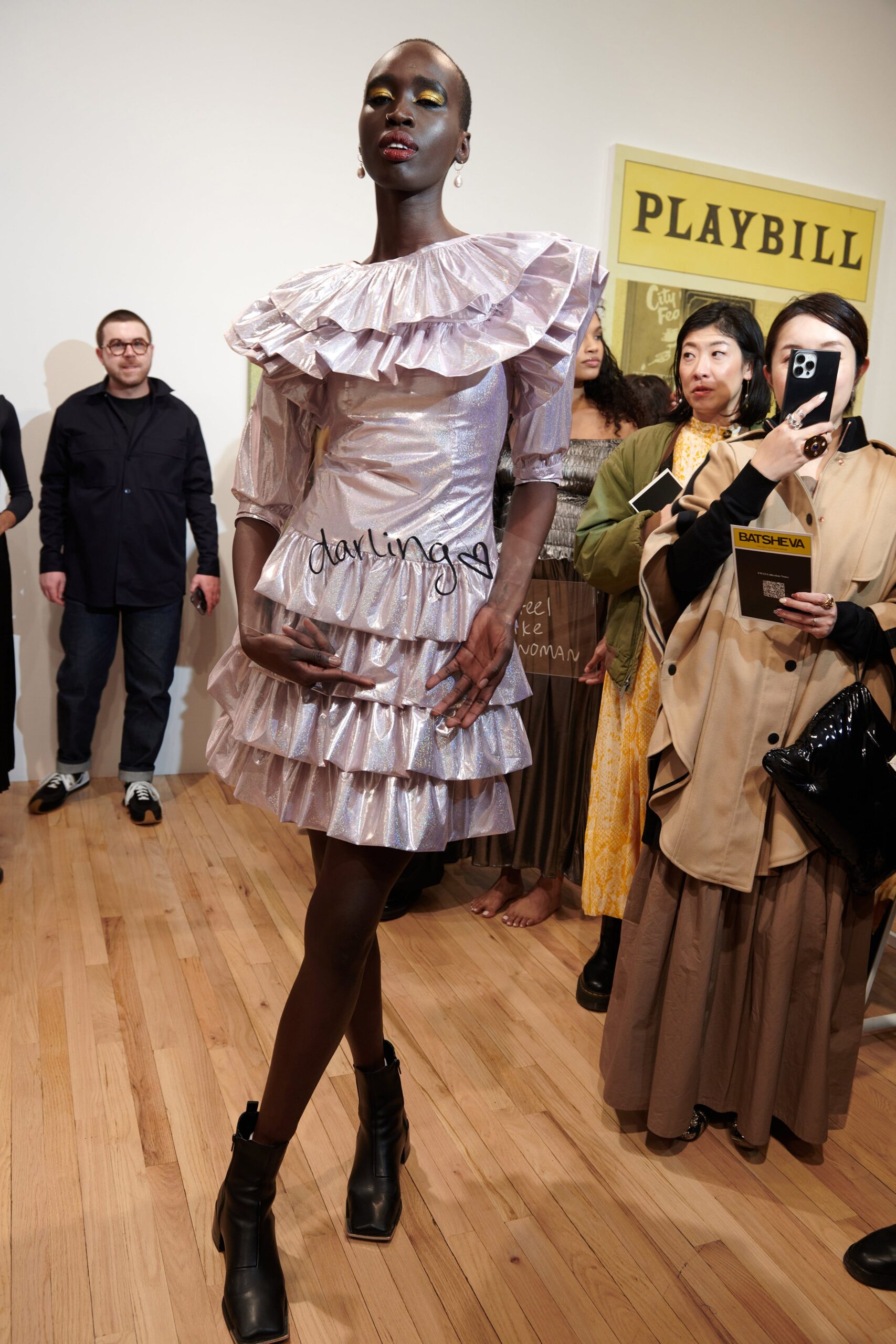 purple ruffled mini dress with boots